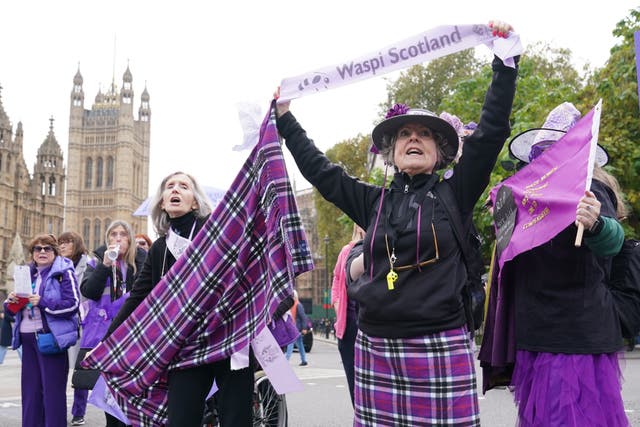 Waspi campaigners staging a protest outside the Houses of Parliament in October (Stefan Rousseau/PA)