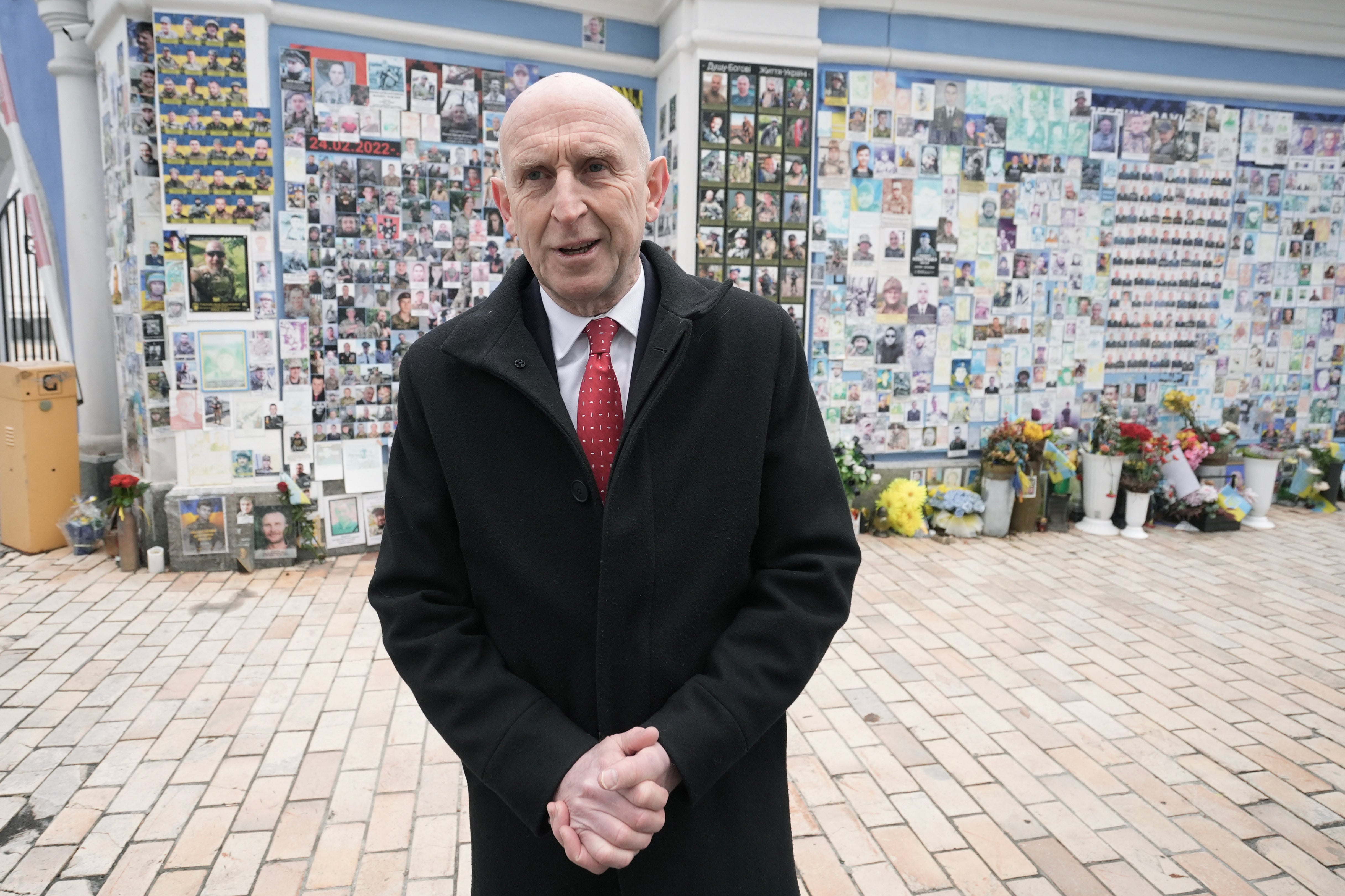 Defence secretary John Healey poses in front of the Wall of Remembrance of the Fallen for Ukraine, which remembers those killed in the conflict with Russia, during his visit to Ukraine, in Kyiv, on 18 December 2024