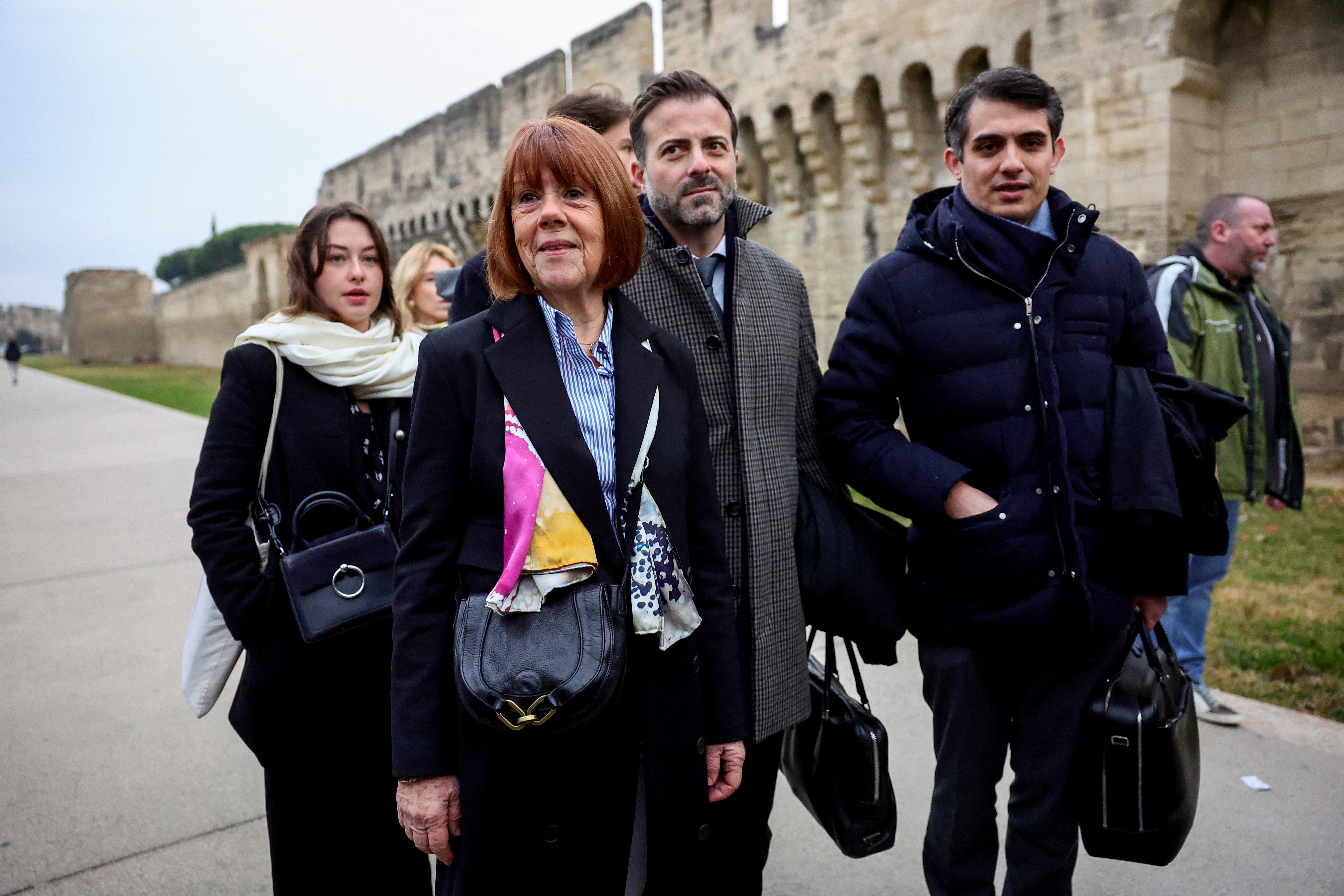 Ms Pelicot arrives with her lawyers at the courthouse in Avignon