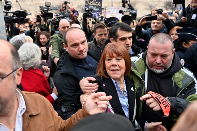 <p>Giséle Pelicot, pictured arriving for the trial verdict in Avignon, was drugged and raped by her husband and dozens of strangers over a decade </p>