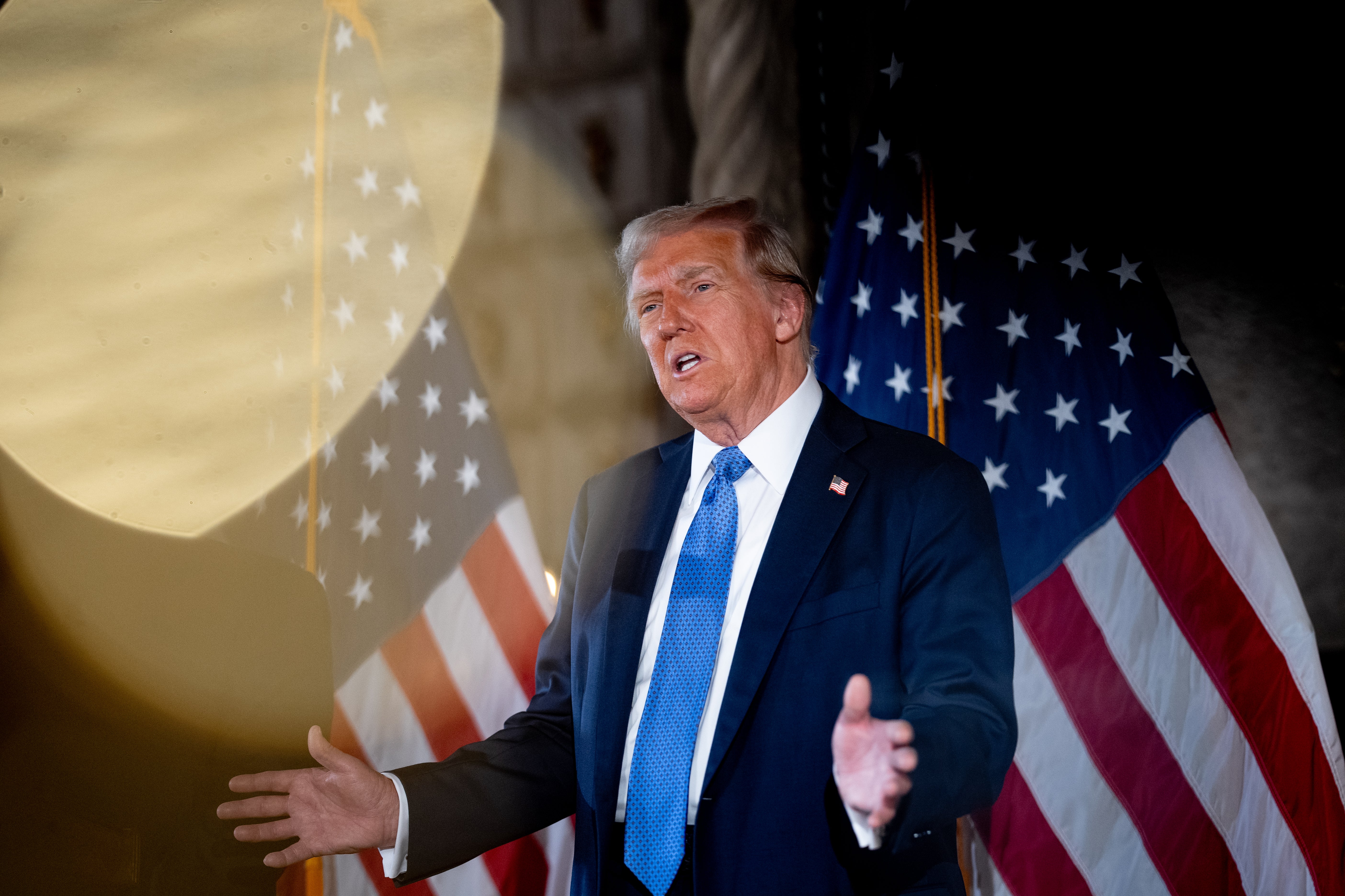 President-elect Donald Trump speaks at a news conference at Trump’s Mar-a-Lago resort on December 16. He recently met with Amazon founder Jeff Bezos at the club.