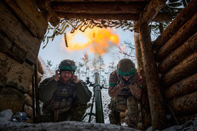 <p>Ukrainian soldiers fire a mortar towards Russian positions in Kreminna, Luhansk  </p>