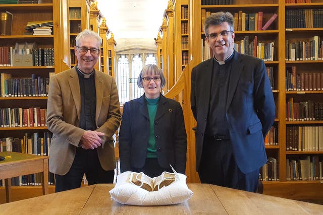 <p>Left to right: Rev Edward Probert, Dr Anne Dutton, Cathedral Librarian and The Very Revd Nicholas Papadopulos, Dean of Salisbury, with the Bible </p>