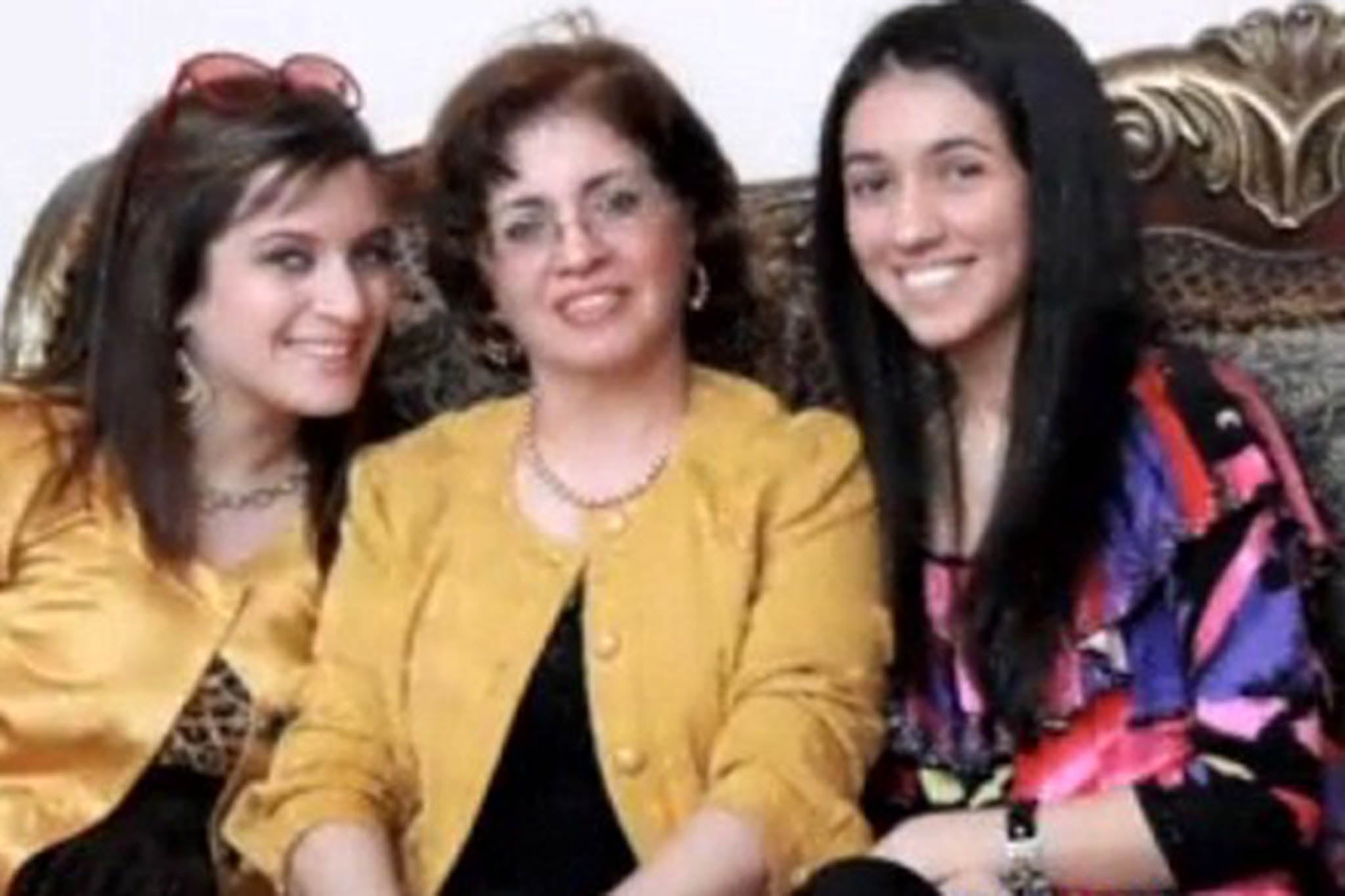 Nasrin Rahmaty, centre, was also murdered by her estranged husband on Christmas day