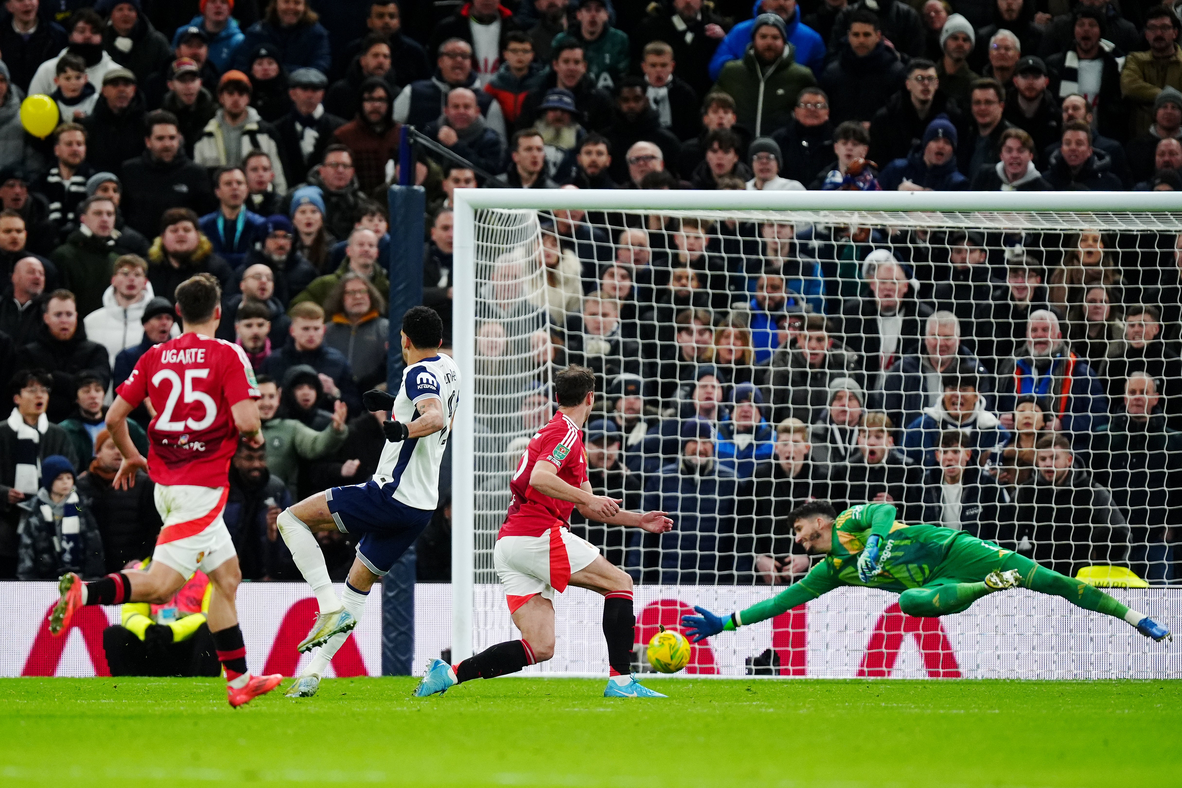 Dominic Solanke (second left) hits the third Tottenham goal (Mike Egerton/PA)