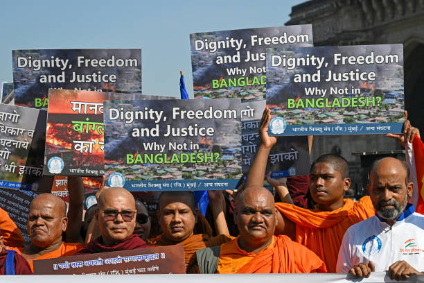 Protesters demonstrate to condemn the atrocities against Bangladesh’s Hindu minority community, in Mumbai, India