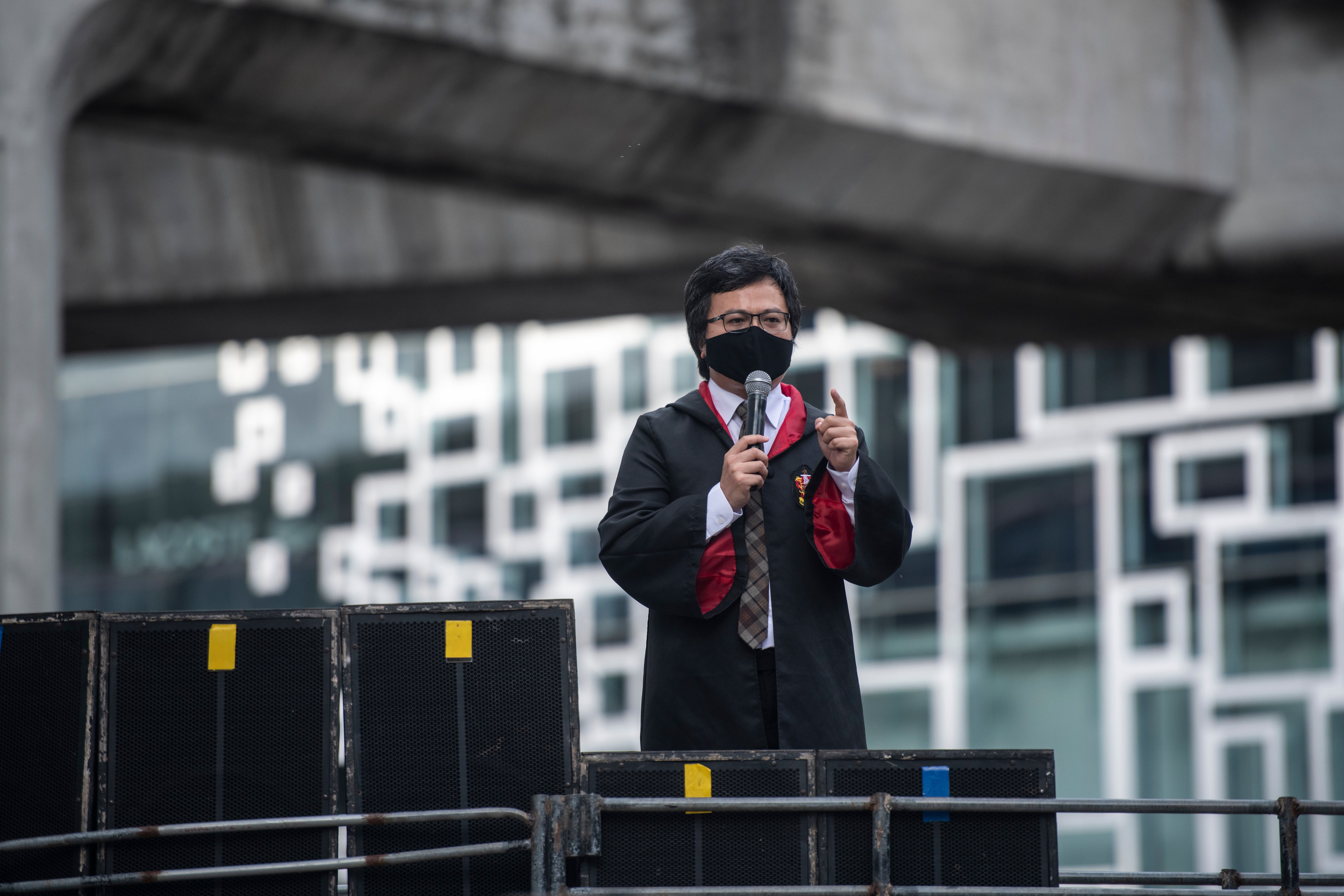 Arnon Nampa, a human rights activist and a key protest leader is seen wearing wizard cloak, while giving speech during the Harry Potter-themed protest in Bangkok