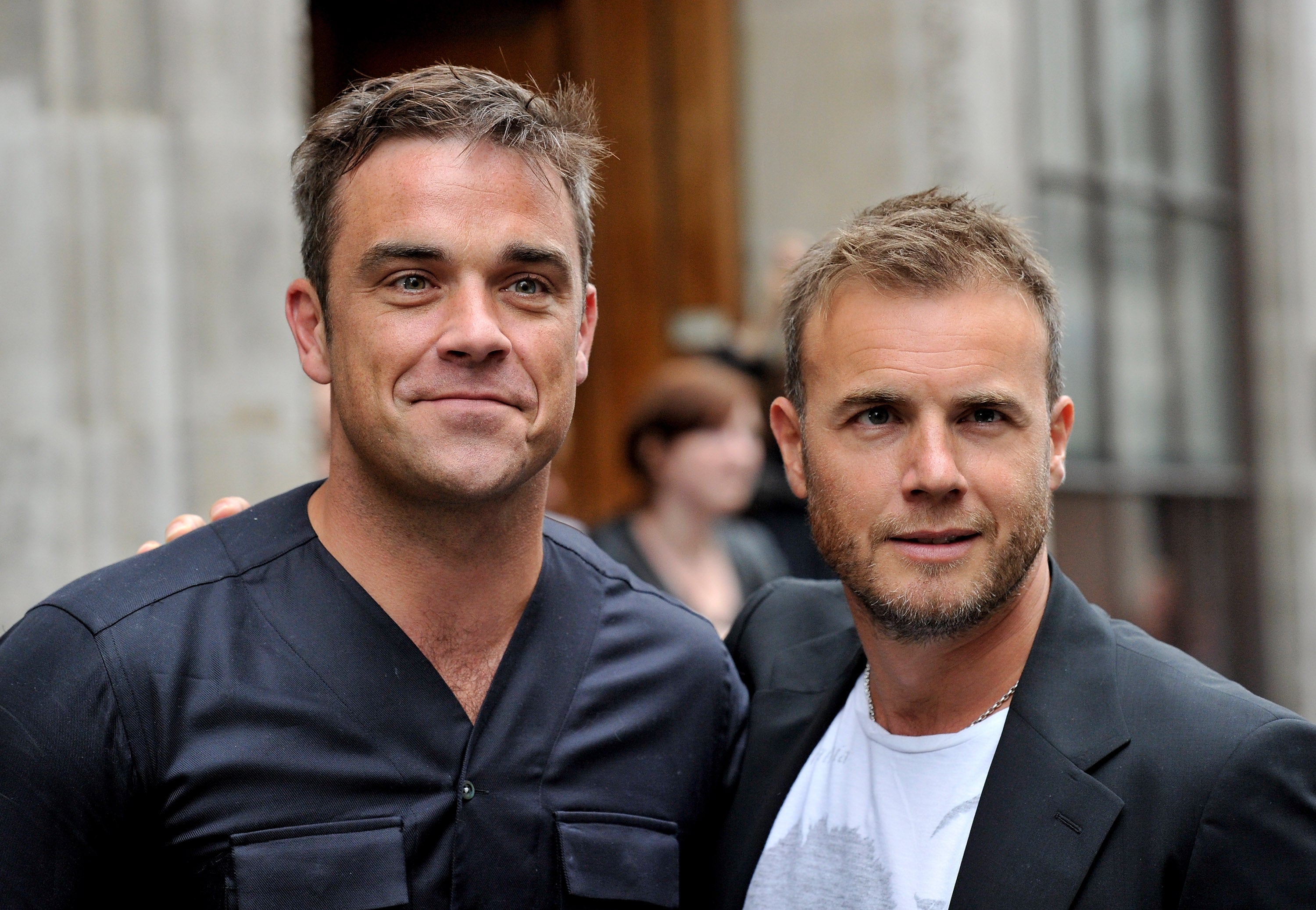 Robbie Williams and Gary Barlow pictured in 2010