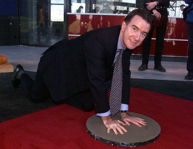 <p>Hartlepool MP Peter Mandelson puts his hands in cement for the opening of the new  6 million pound Warner Cinema at the Marina Village in Hartlepool.  24/1/2001</p>