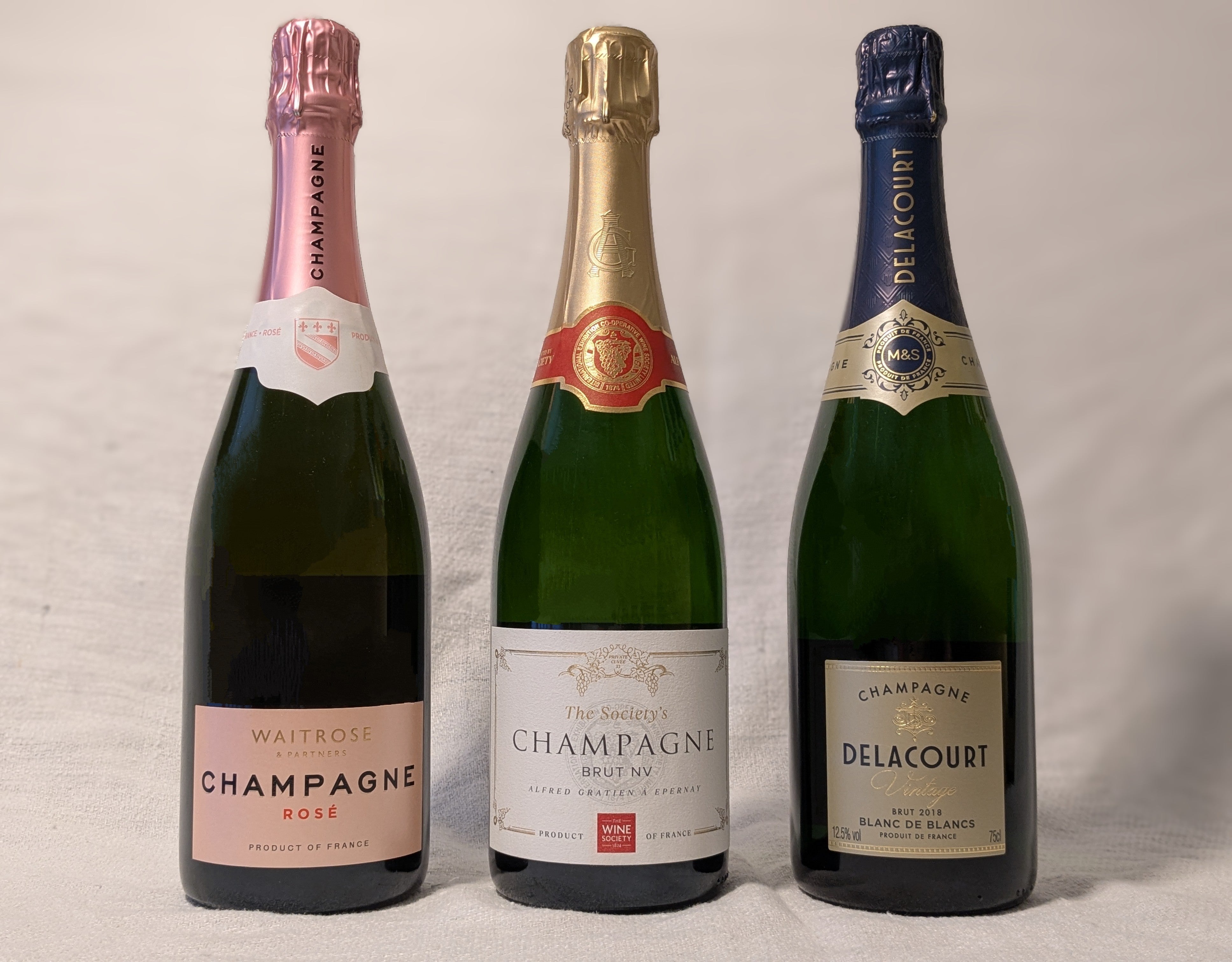 Waitrose Rosé Brut Champagne, The Society’s Champagne Brut and M&S Delacourt Blanc de Blancs Vintage Champagne