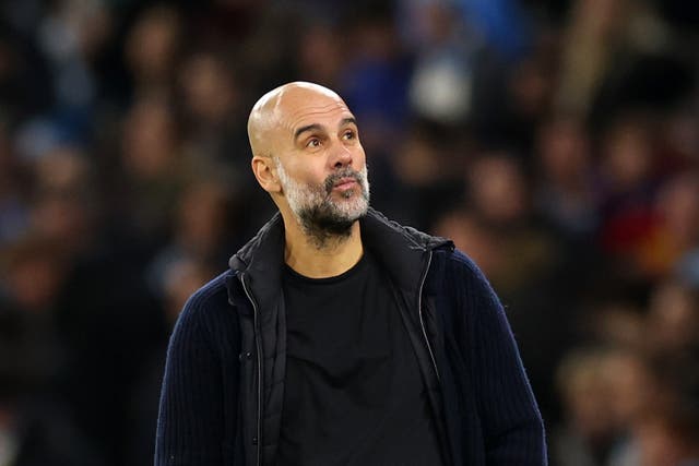 <p>Pep Guardiola looks dejected during Manchester City’s unforseen crisis</p>