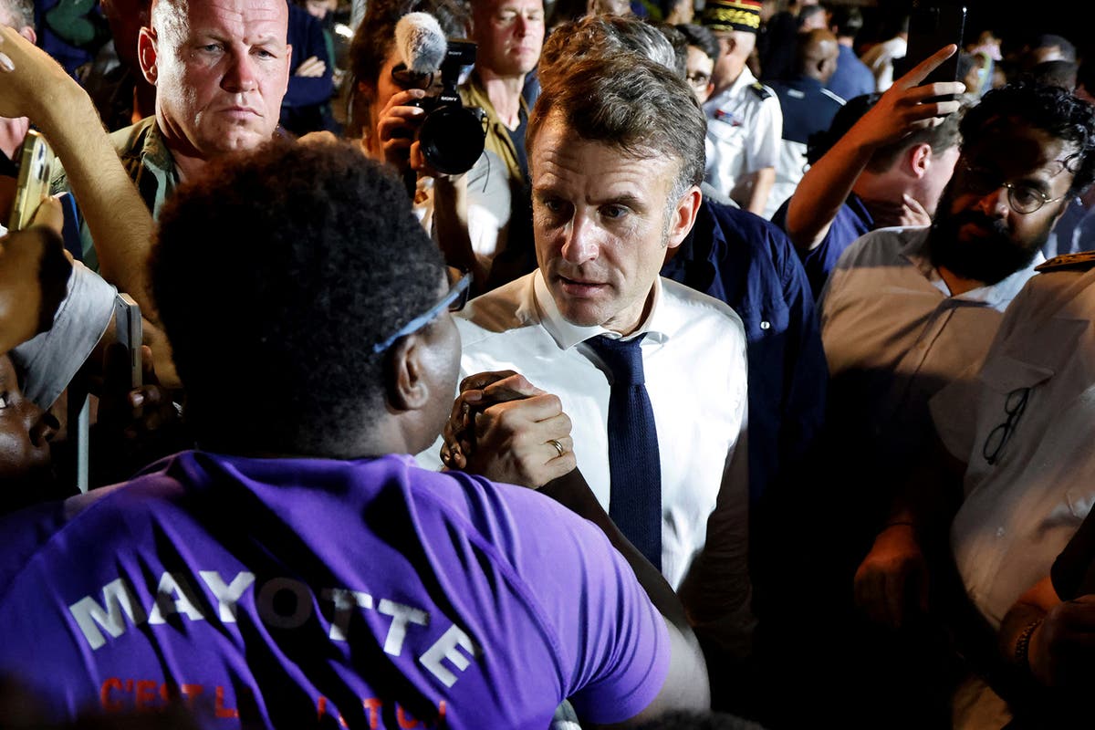 Macron swears during angry exchange with heckling crowd while visiting cyclone-battered Mayotte