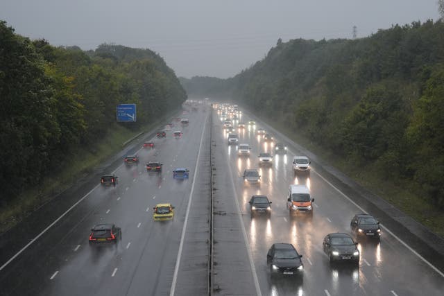 Some sleet, snow and hail may fall at lower levels and produce icy conditions by Sunday morning, forecasters warned (Andrew Matthews/PA)