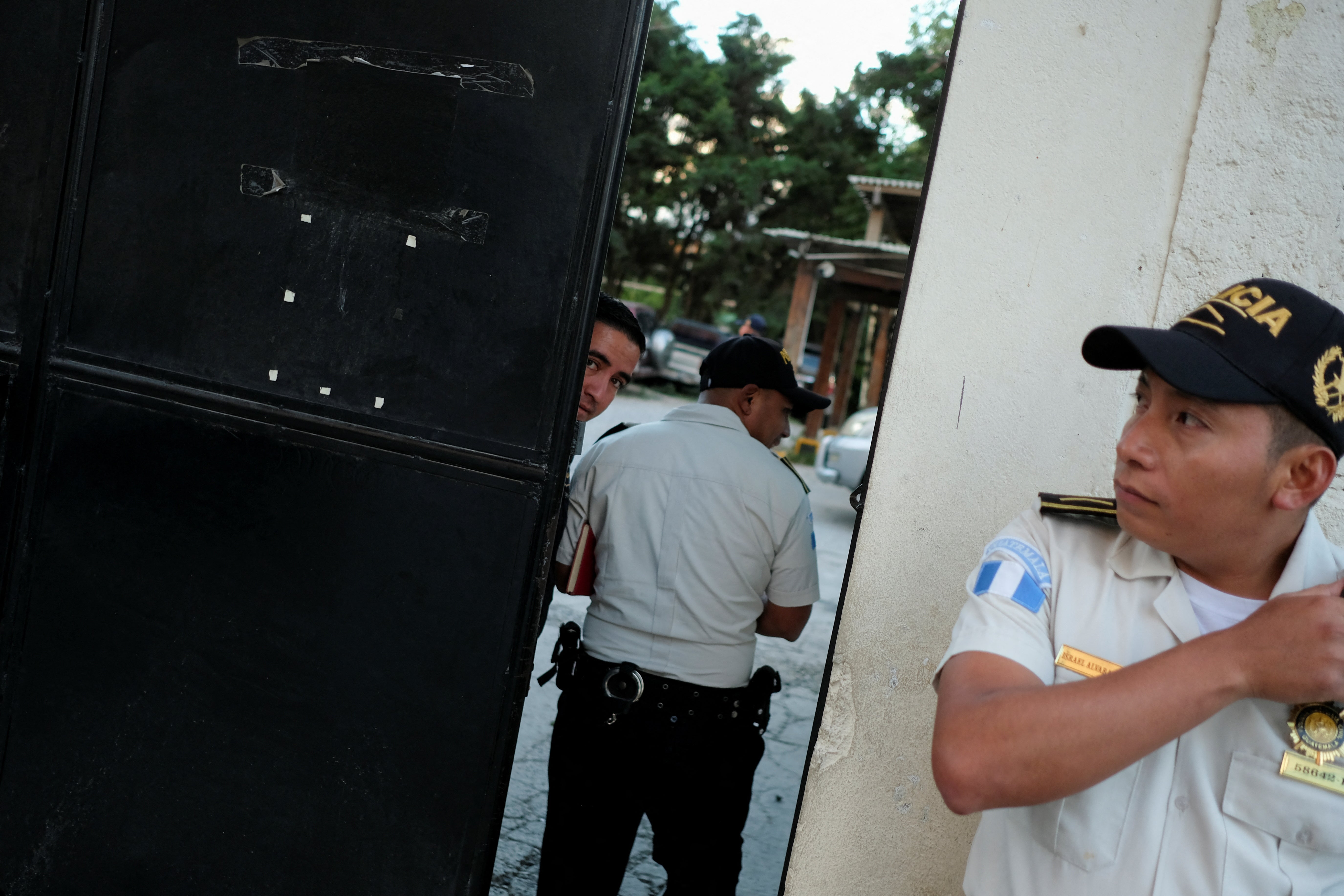 File. Police stand guard at the Guatemalan Attorney General’s Office after authorities at least 200 children and women from Lev Tahor Jewish sect