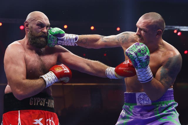 <p>Tyson Fury (left) lost to Oleksandr Usyk on all three scorecards in their rematch</p>