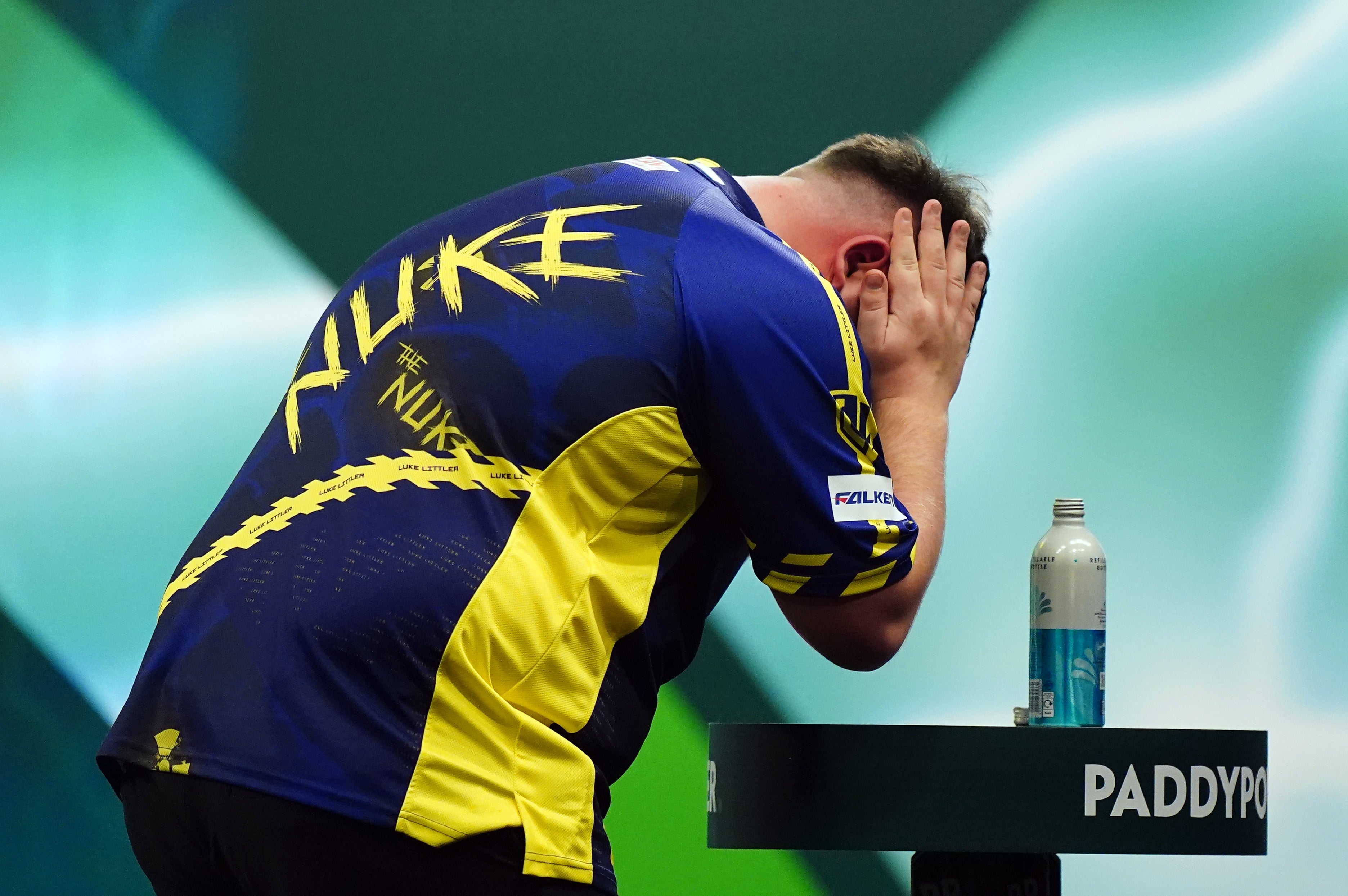 <p>Luke Littler was tearful after his first-round win over Ryan Meikle </p>