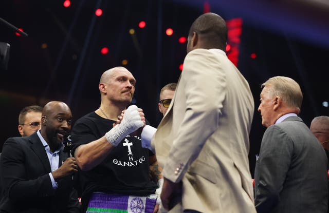 <p>Daniel Dubois stormed the ring during Oleksandr Usyk’s post-fight celebrations </p>