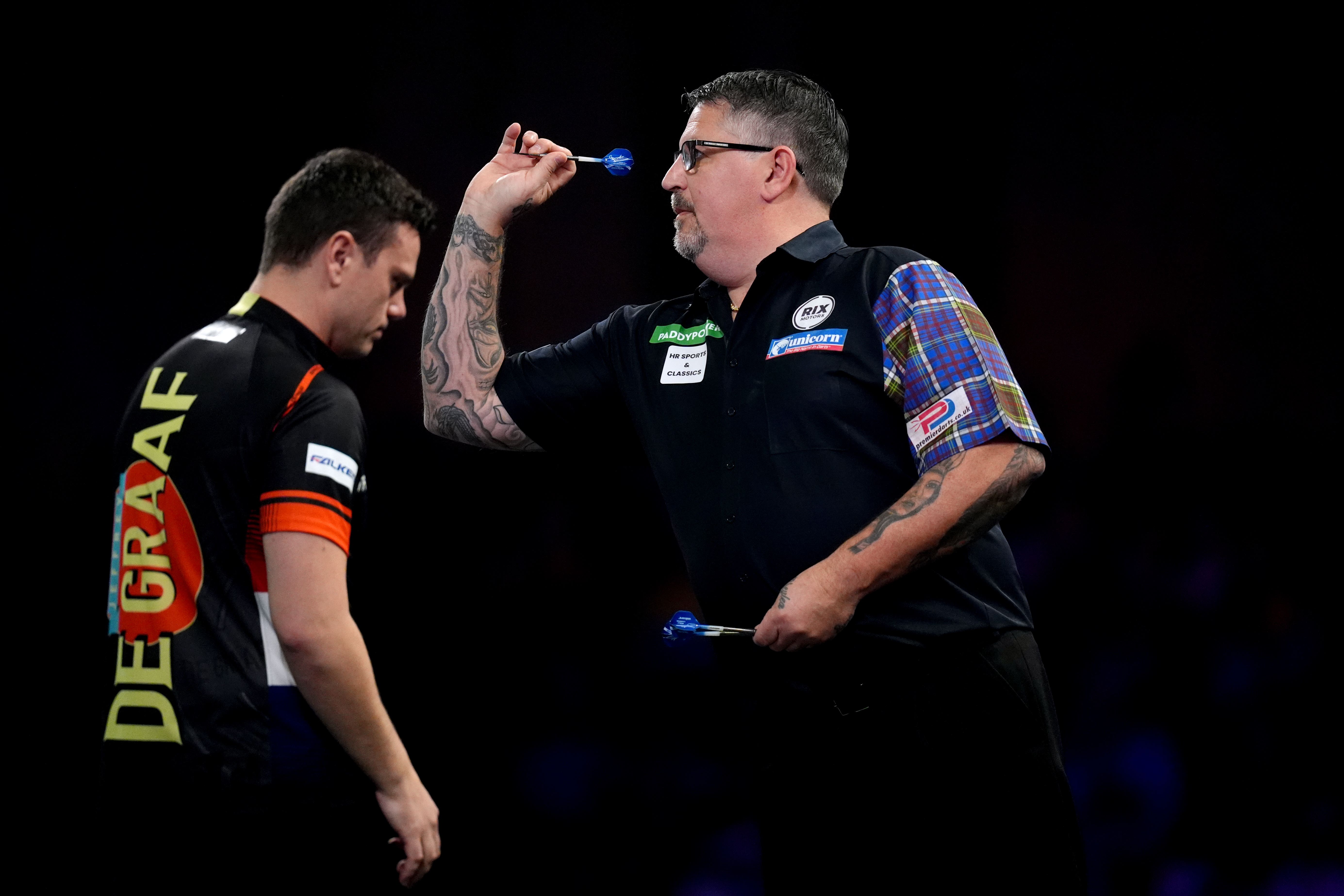 Gary Anderson throws during his match against Jeffrey de Graaf on day eight of the Paddy Power World Darts Championship at Alexandra Palace, London. Picture date: Sunday December 22, 2024.