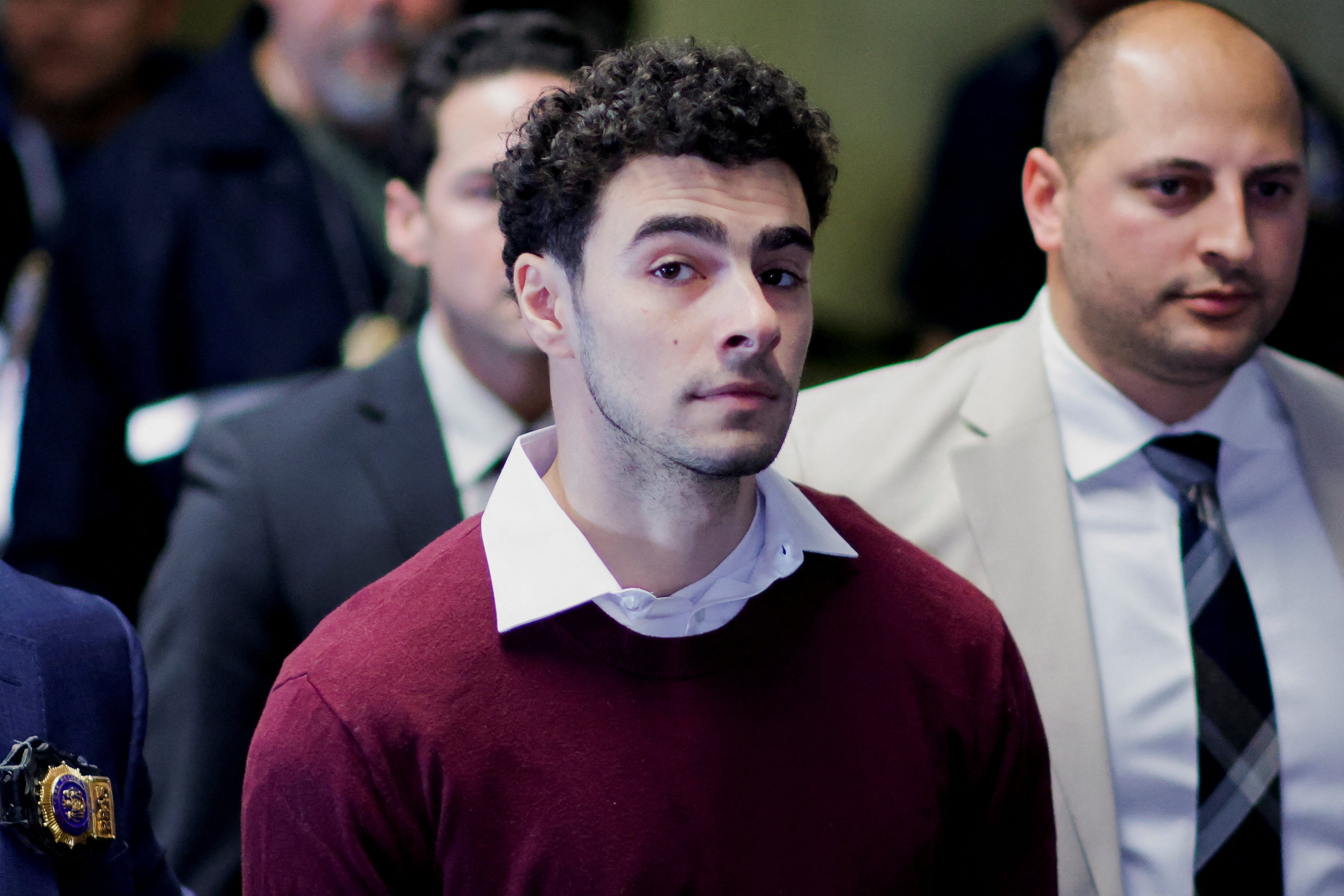 Luigi Mangione, the man accused of killing UnitedHealthcare CEO Brian Thompson, attends his arraignment in New York on Monday morning. Mangione pleaded not guilty to state terror and murder charges