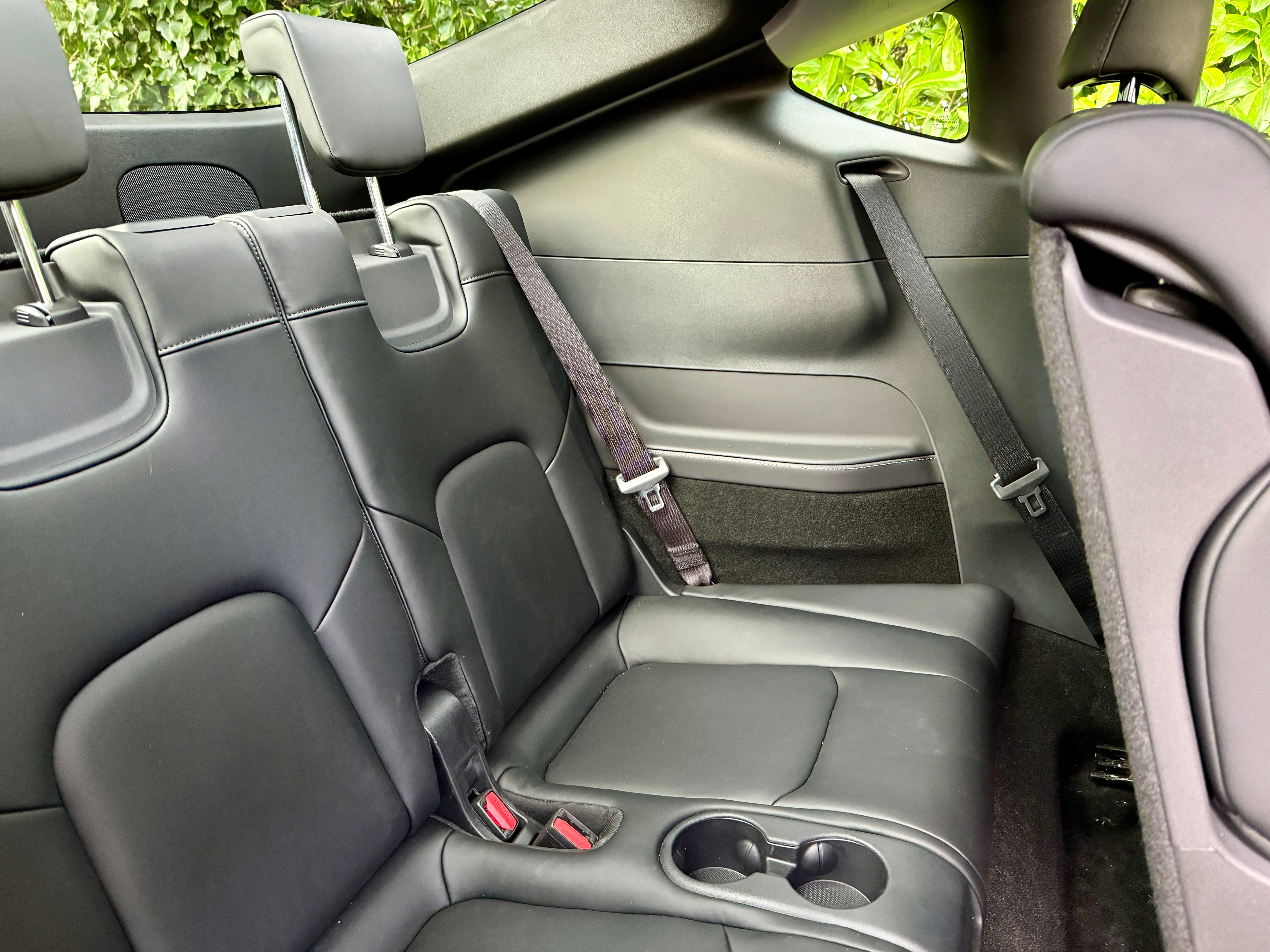 To get any legroom in the rearmost seats of the Tesla Model Y you have to move the middle row forward