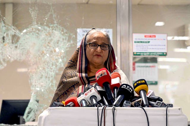 <p>File: Bangladesh’s former prime minister Sheikh Hasina addresses the media at a vandalized metro station in Mirpur</p>