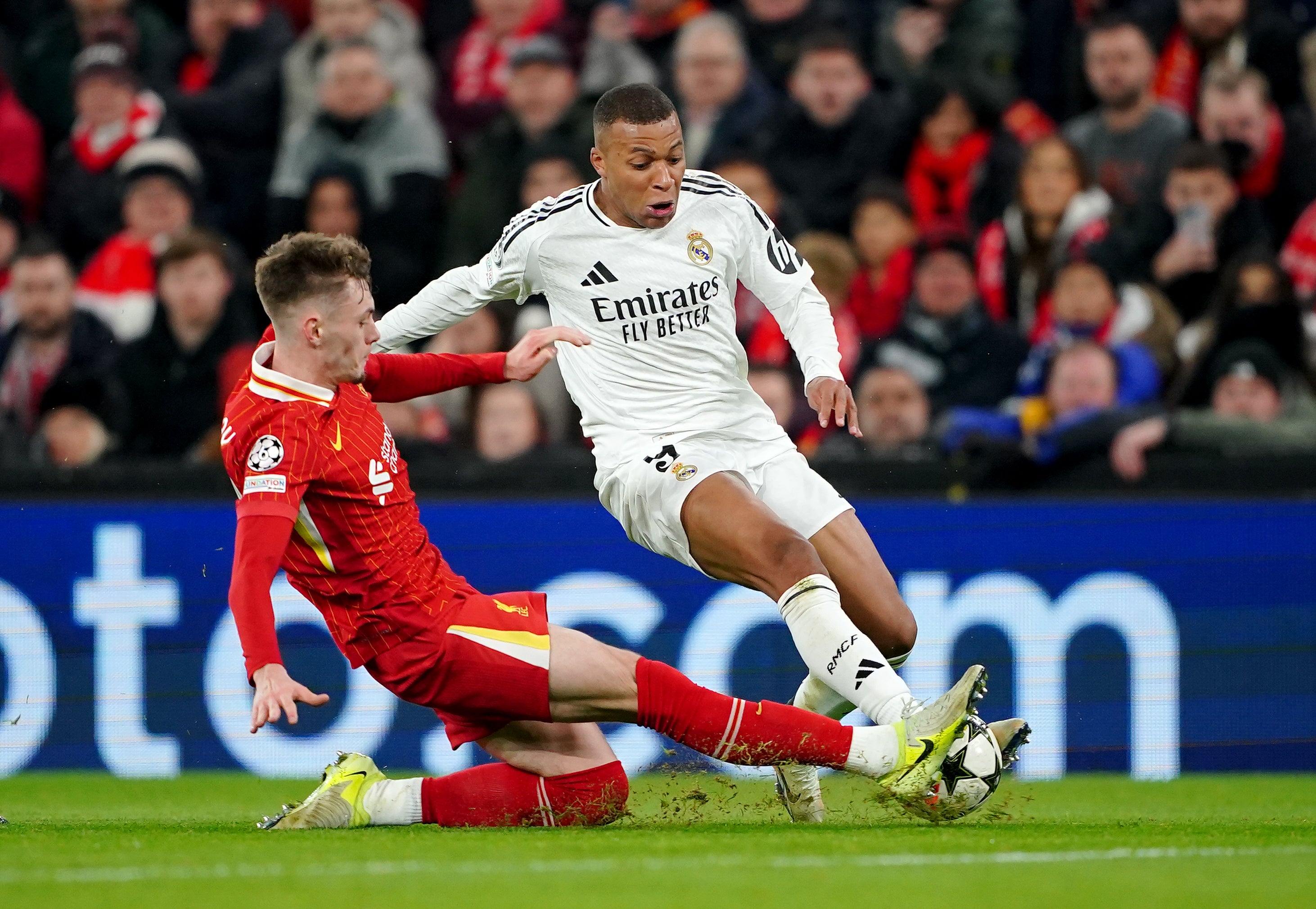 Liverpool's Conor Bradley brilliantly tackles Real Madrid's Kylian Mbappé