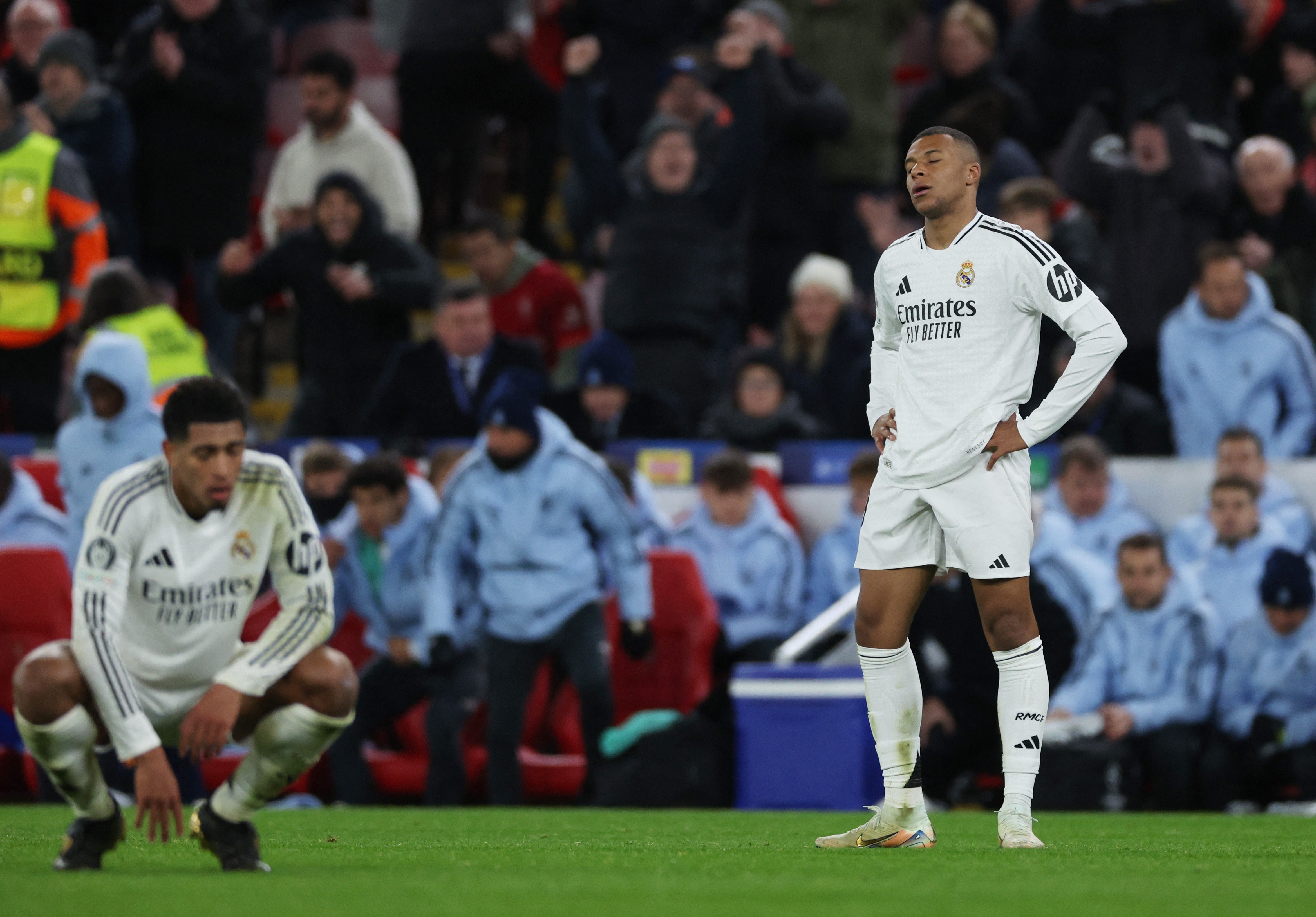 Real Madrid's Jude Bellingham and Kylian Mbappe look dejected against Liverpool