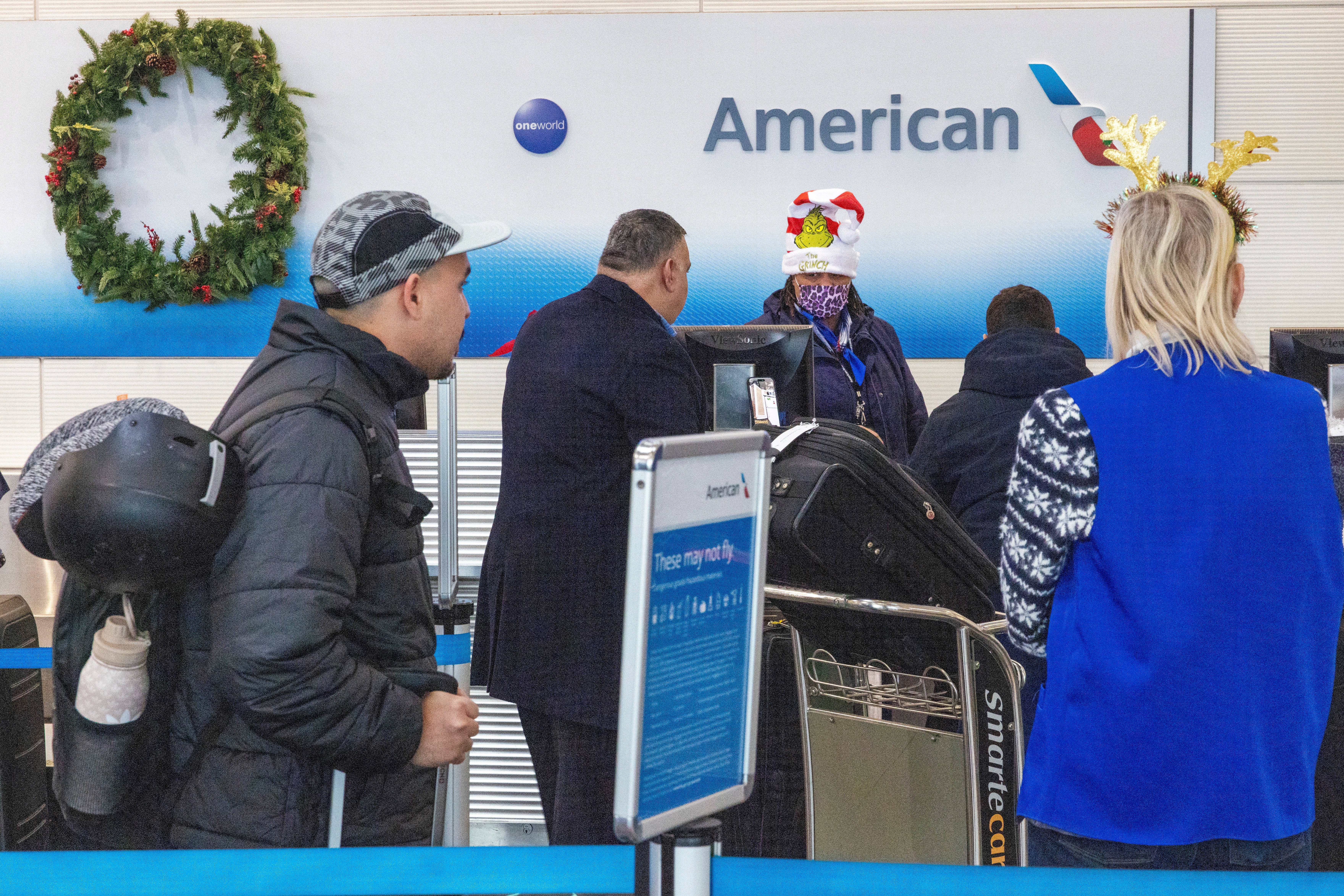 Passengers seek help at Ronald Reagan Washington National Airport in Arlington, Virginia, USA, 24 December 2024