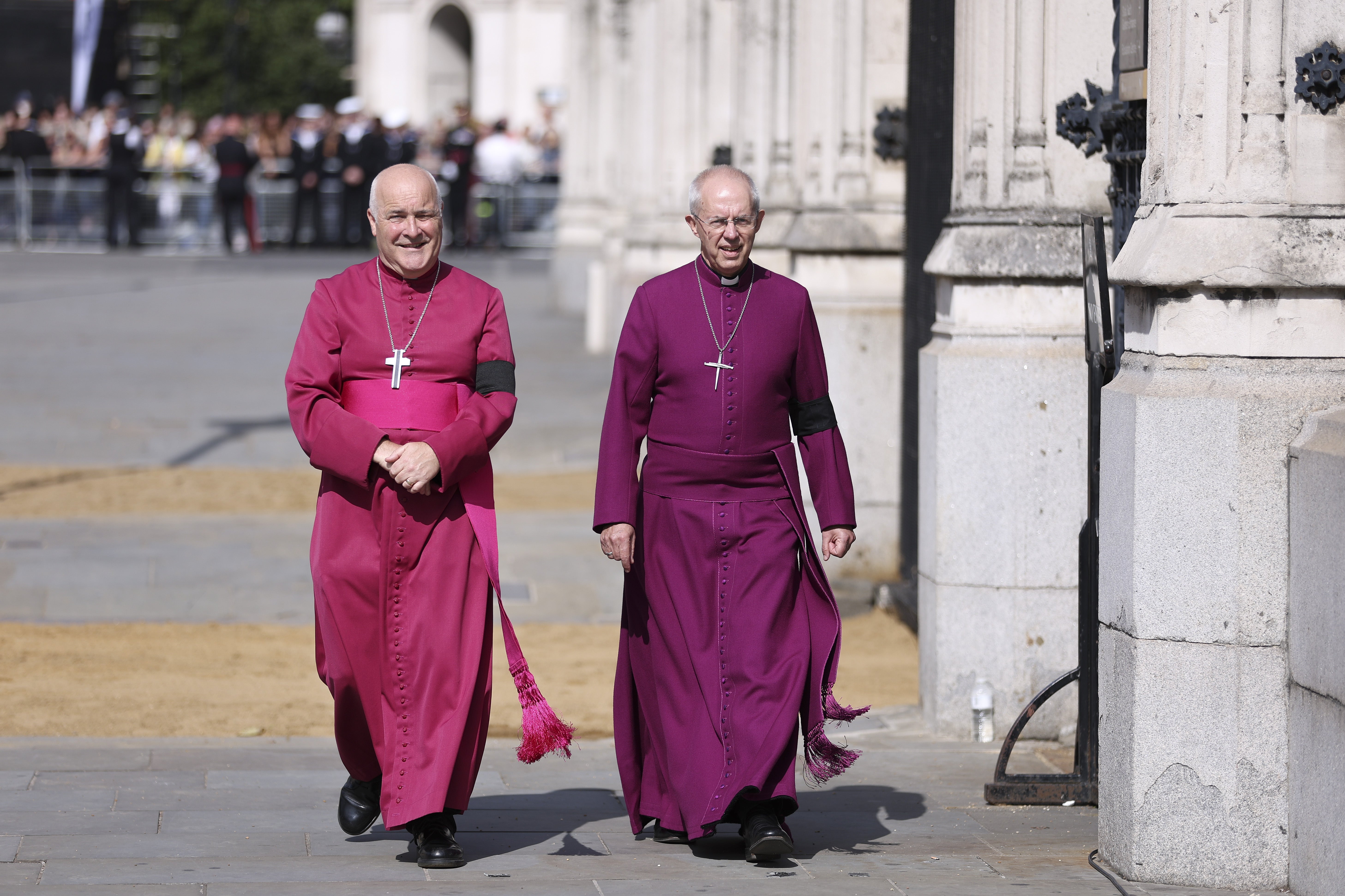 Archbishop of York Stephen Geoffrey Cottrell and Archbishop of Canterbury, Justin Welby walking through Westminster