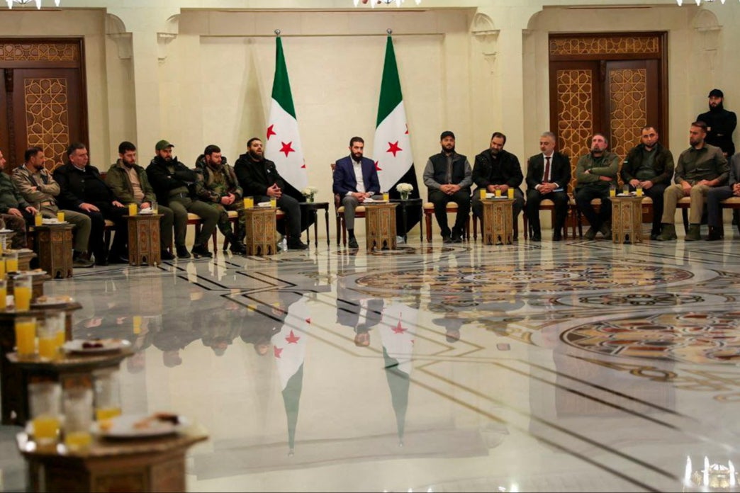 yria’s de facto leader Ahmed al-Sharaa attends a meeting with former rebel faction chiefs on Tuesday