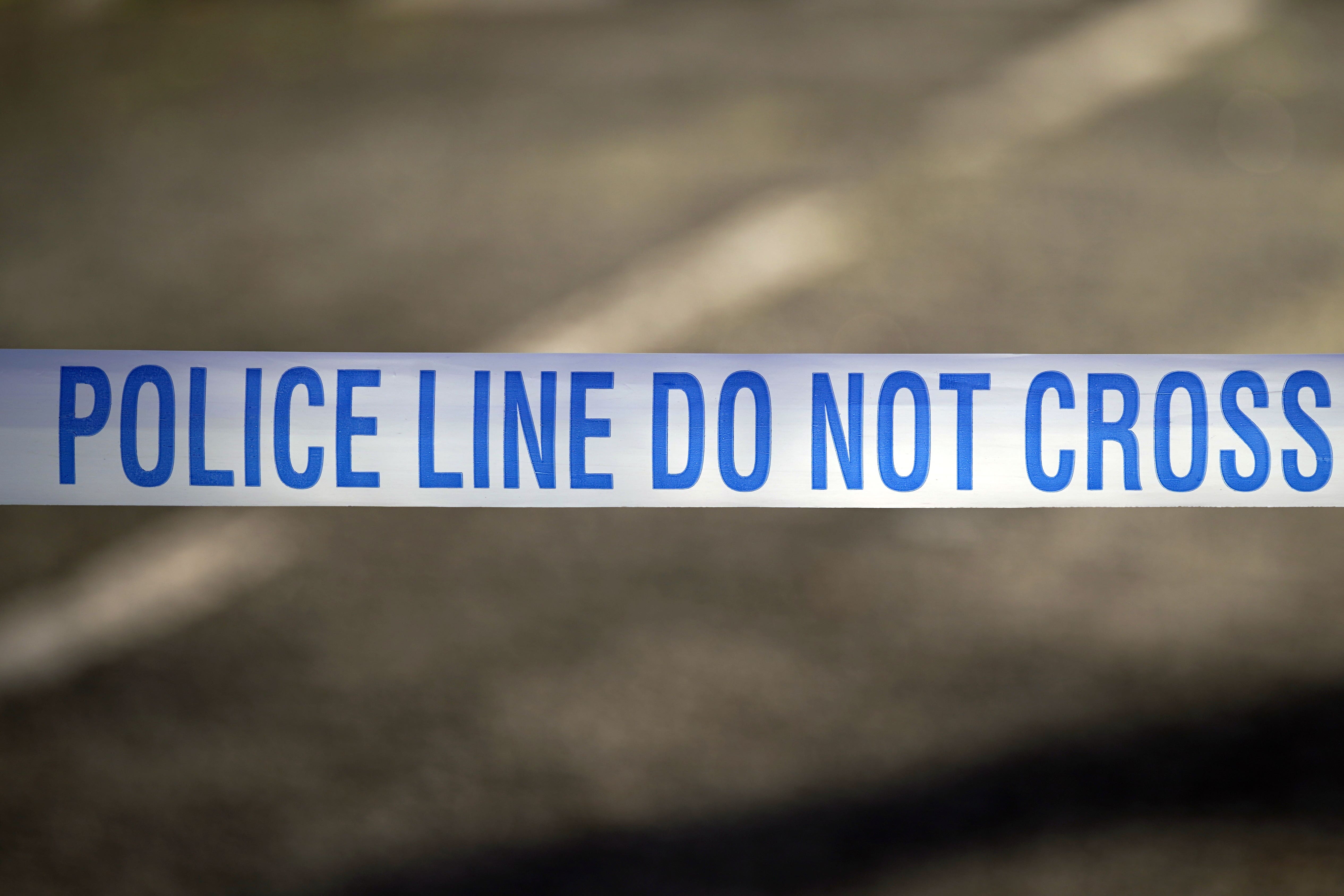 FILE – Police tape near a scene of a suspected crime (PA)