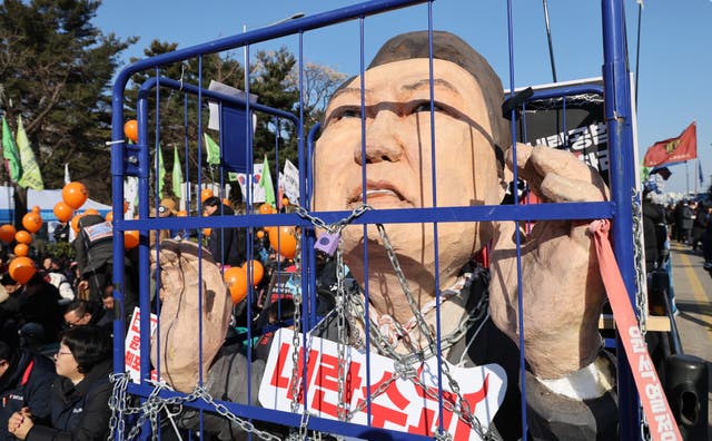 <p>Protesters call for the impeachment of South Korean President Yoon Suk Yeol in front of National Assembly on December 14, 2024 in Seoul</p>