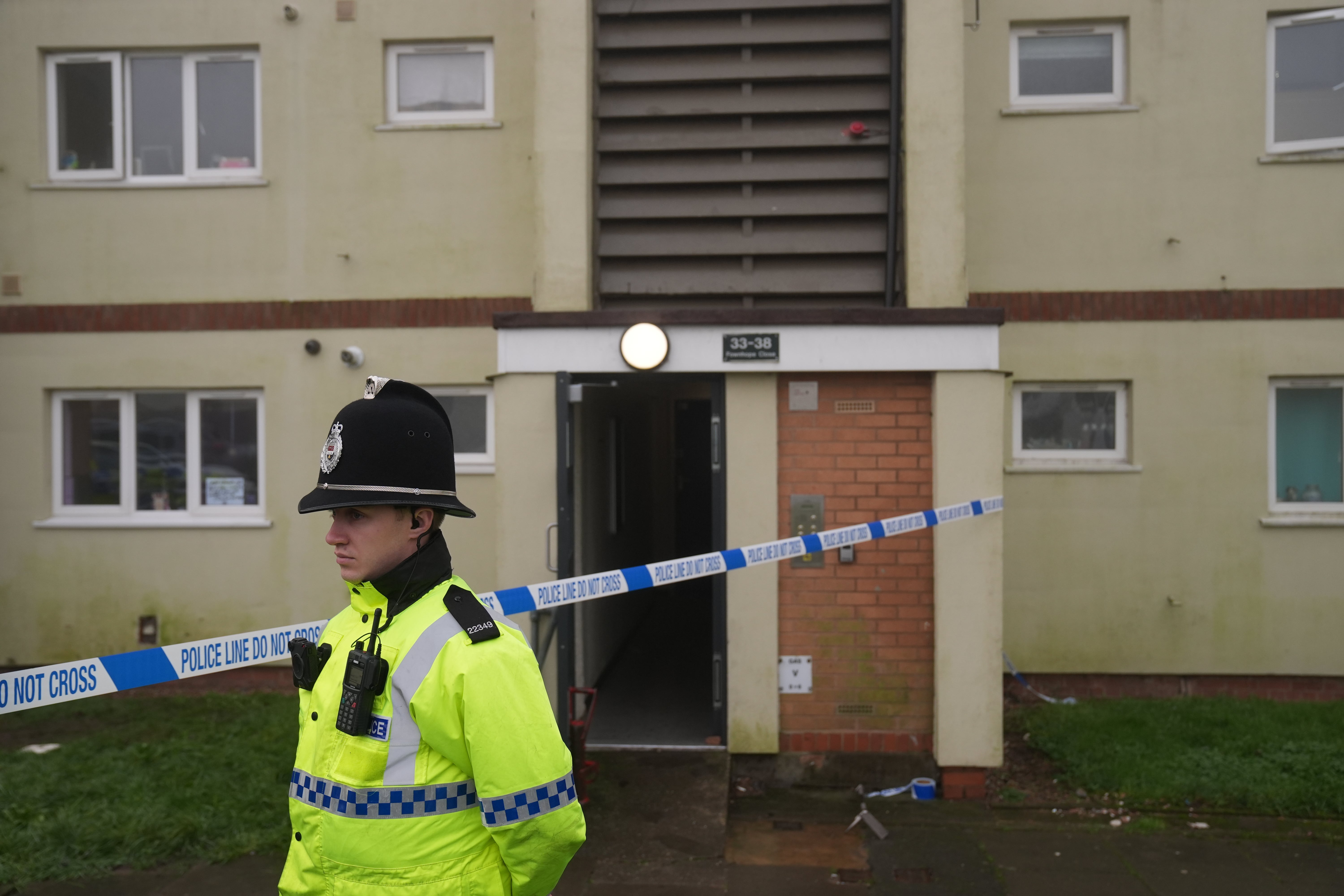 Police at the scene on Fownhope Close in Redditch, Worcestershire, where a 39-year-old man was shot by armed police on Christmas Eve.