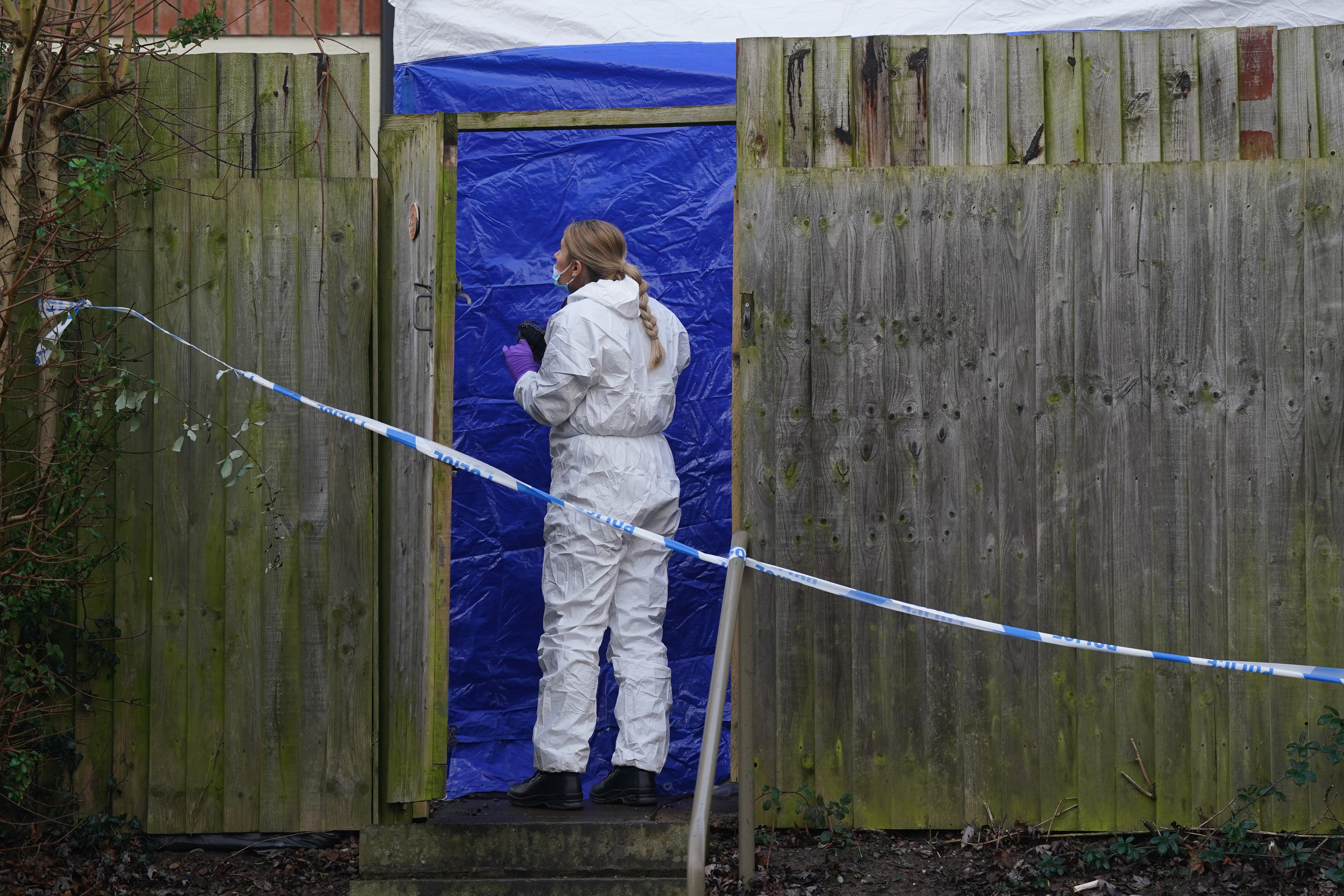 A forensic investigator at the scene on Fownhope Close in Redditch