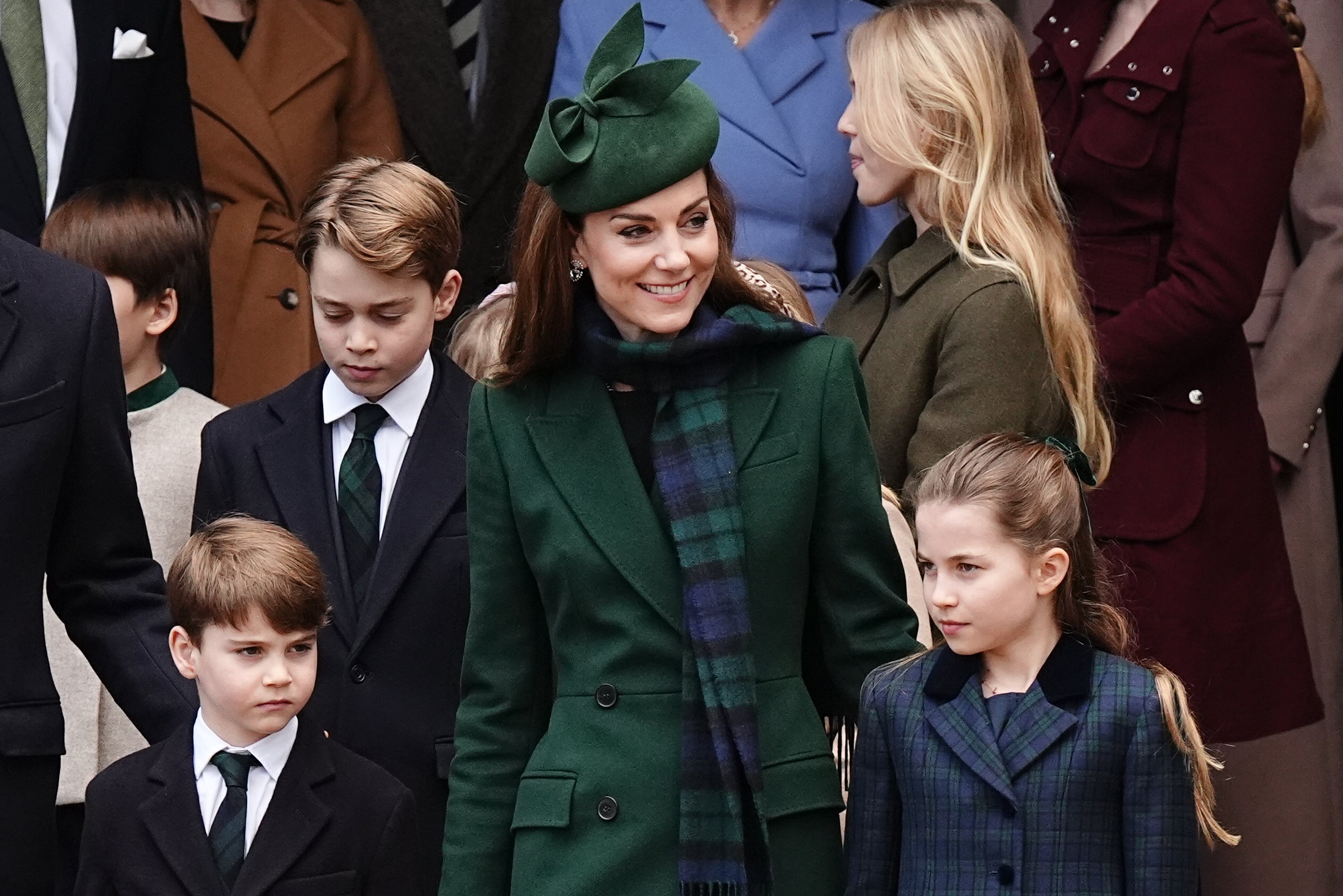 Prince Louis, Prince George, the Princess of Wales and Princess Charlotte following the Christmas Day morning church service at St Mary Magdalene Church