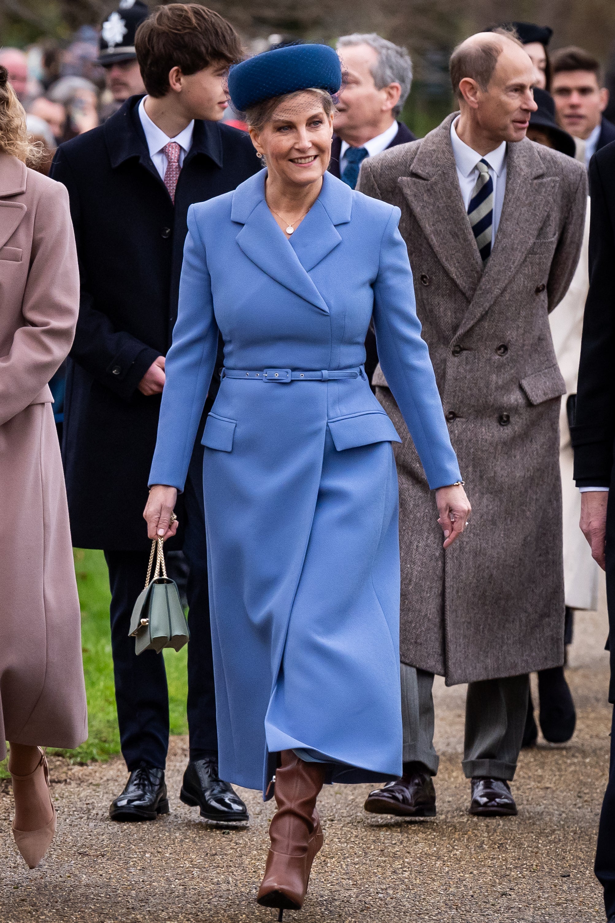 The Duchess of Edinburgh attending the service with her husband the Duke behind her