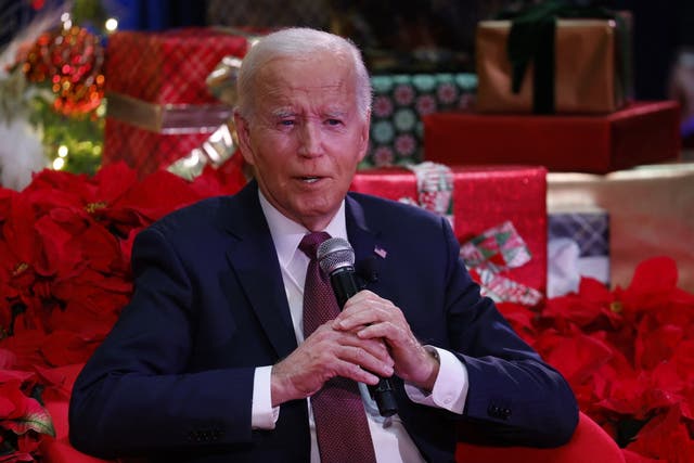 <p>US President Joe Biden speaks during a holiday visit to patients and families at Children's National Hospital in Washington, DC, on December 20, 2024</p>