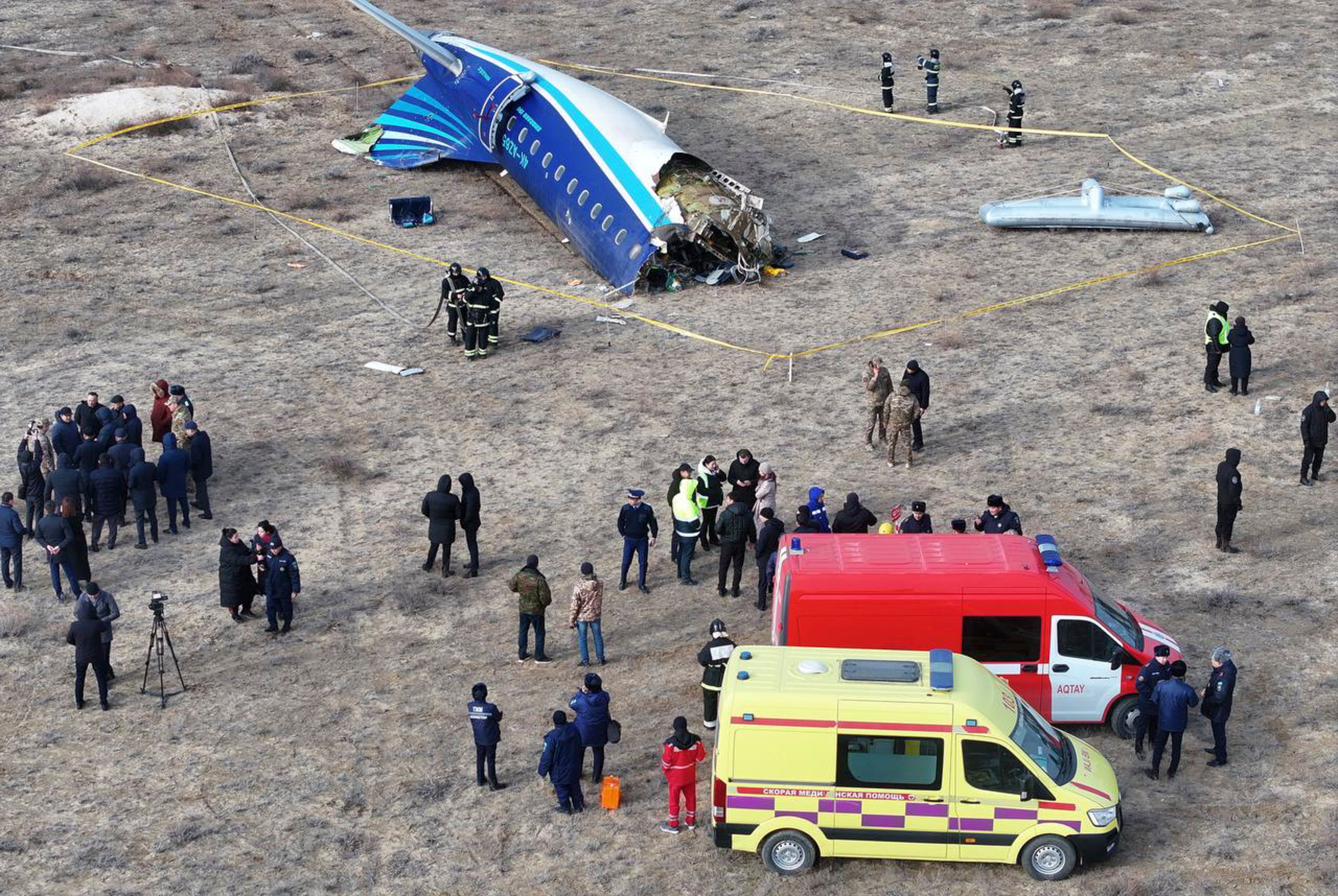 The rear of the crashed Azerbaijan Airlines Embraer ERJ-190 in Aktau, Kazakhstan