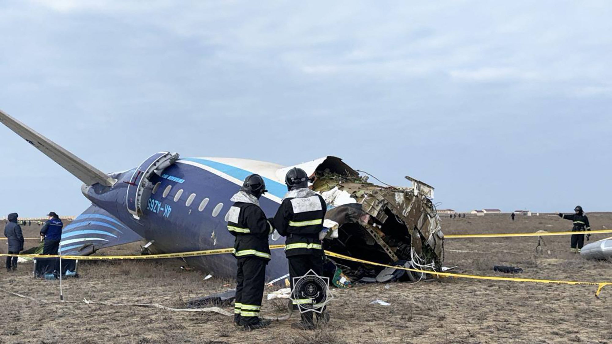 Emergency workers at the crash site in Kazakhstan