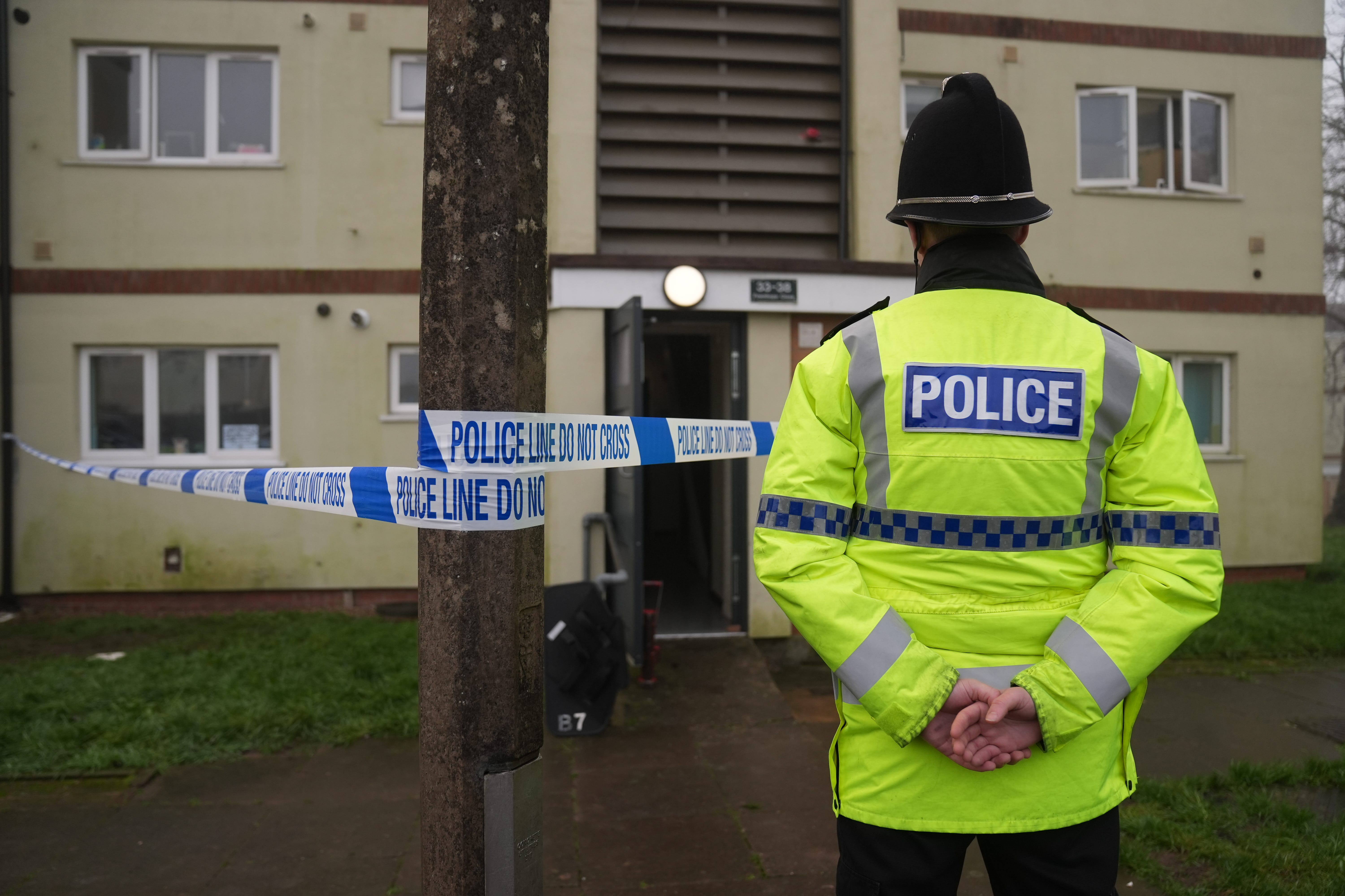 Police at the scene on Fownhope Close in Redditch, Worcestershire, where a 39-year-old man was shot by armed police on Christmas Eve (Jacob King/PA)