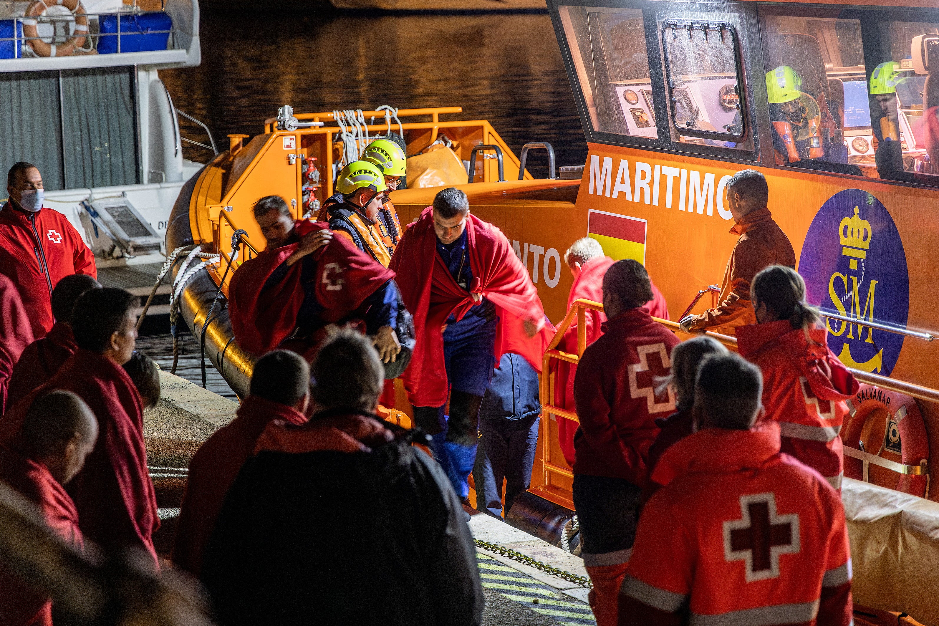 Survivors from Ursa Major disembark from a Spanish Maritime Rescue ship