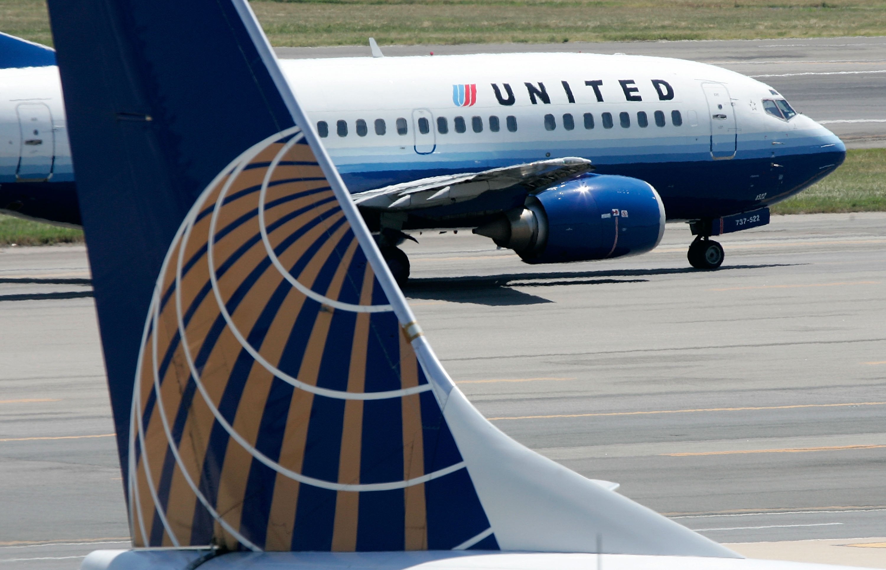 A body was found inside the wheel well of a United Airlines flight on Christmas Eve