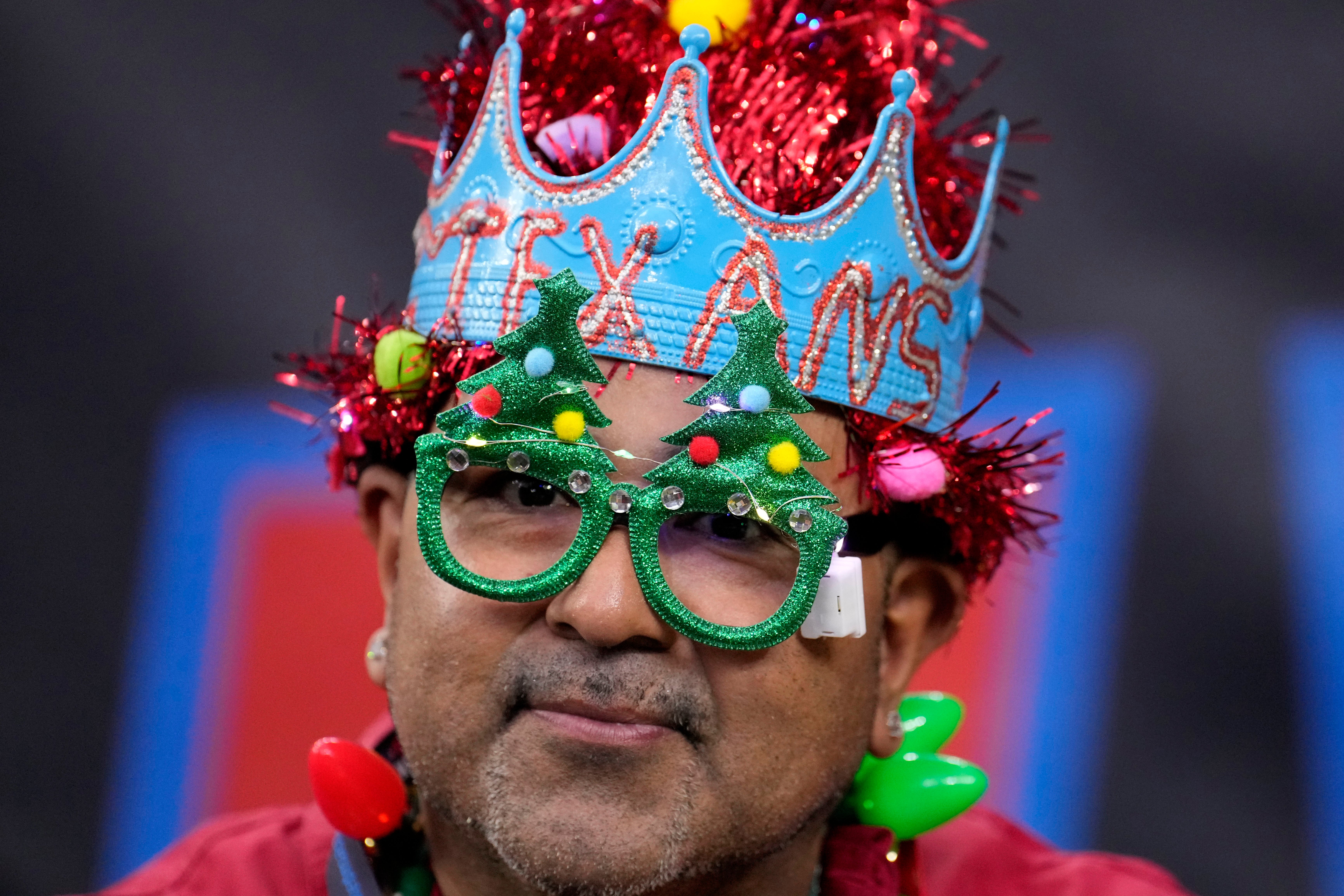 A fan watches players warm up before the game