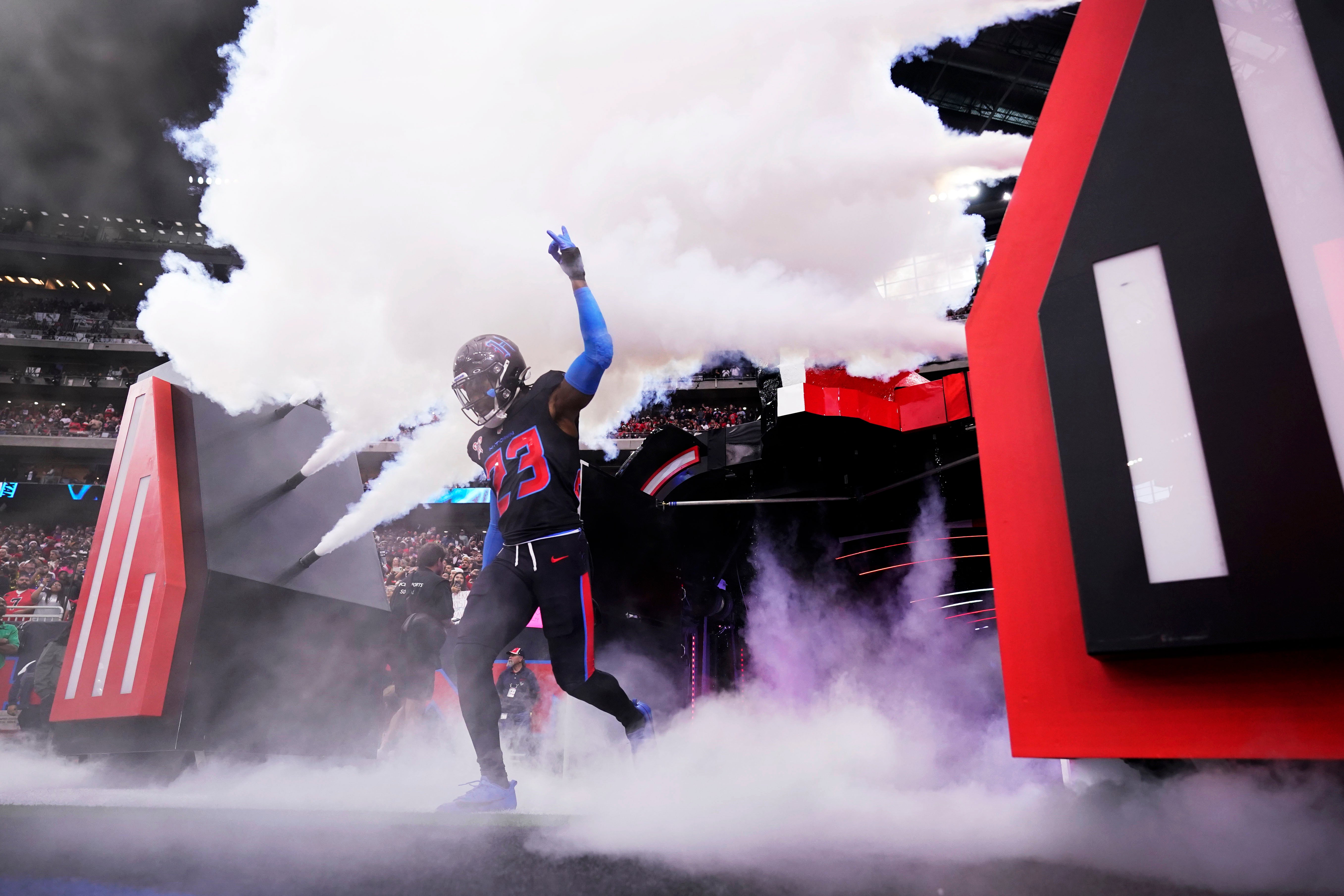 Houston Texans safety Eric Murray (23) runs onto the field during player introductions before an NFL football game against the Baltimore Ravens, December 25, 2024, in Houston