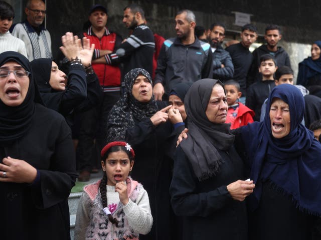 <p>File. Palestinian women mourn relatives killed in an Israeli strike during their funeral at the al-Awda Hospital at the Nuseirat refugee Camp in the central Gaza Strip on 7 December 2024, amid the ongoing conflict between Israel and the Palestinian Hamas militant group</p>