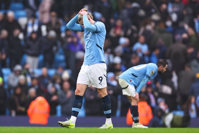 <p>Erling Haaland and Bernardo Silva react at full-time</p>