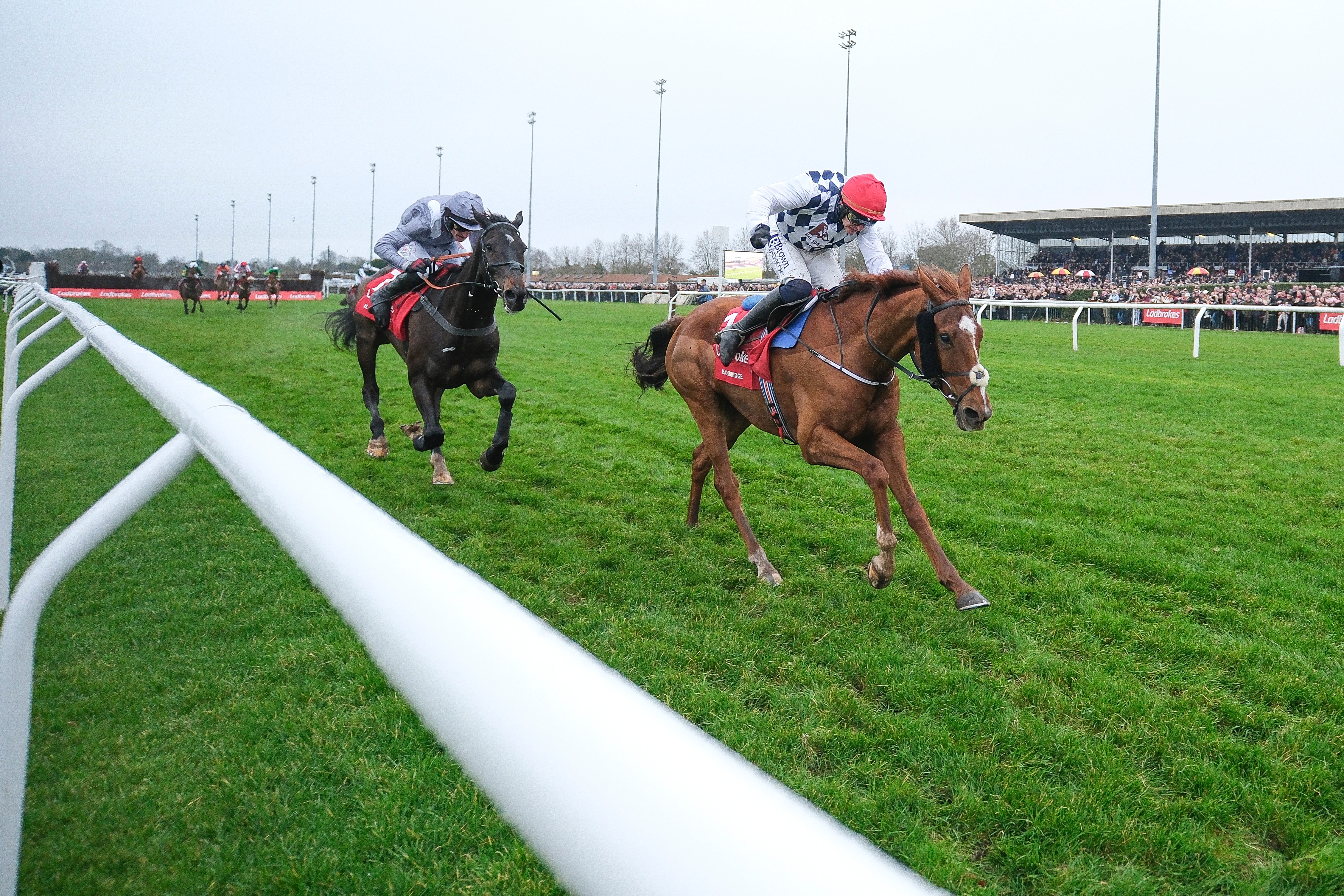 Banbridge was behind heading over the last but pulled clear of Il Est Francais to win the King George VI Chase