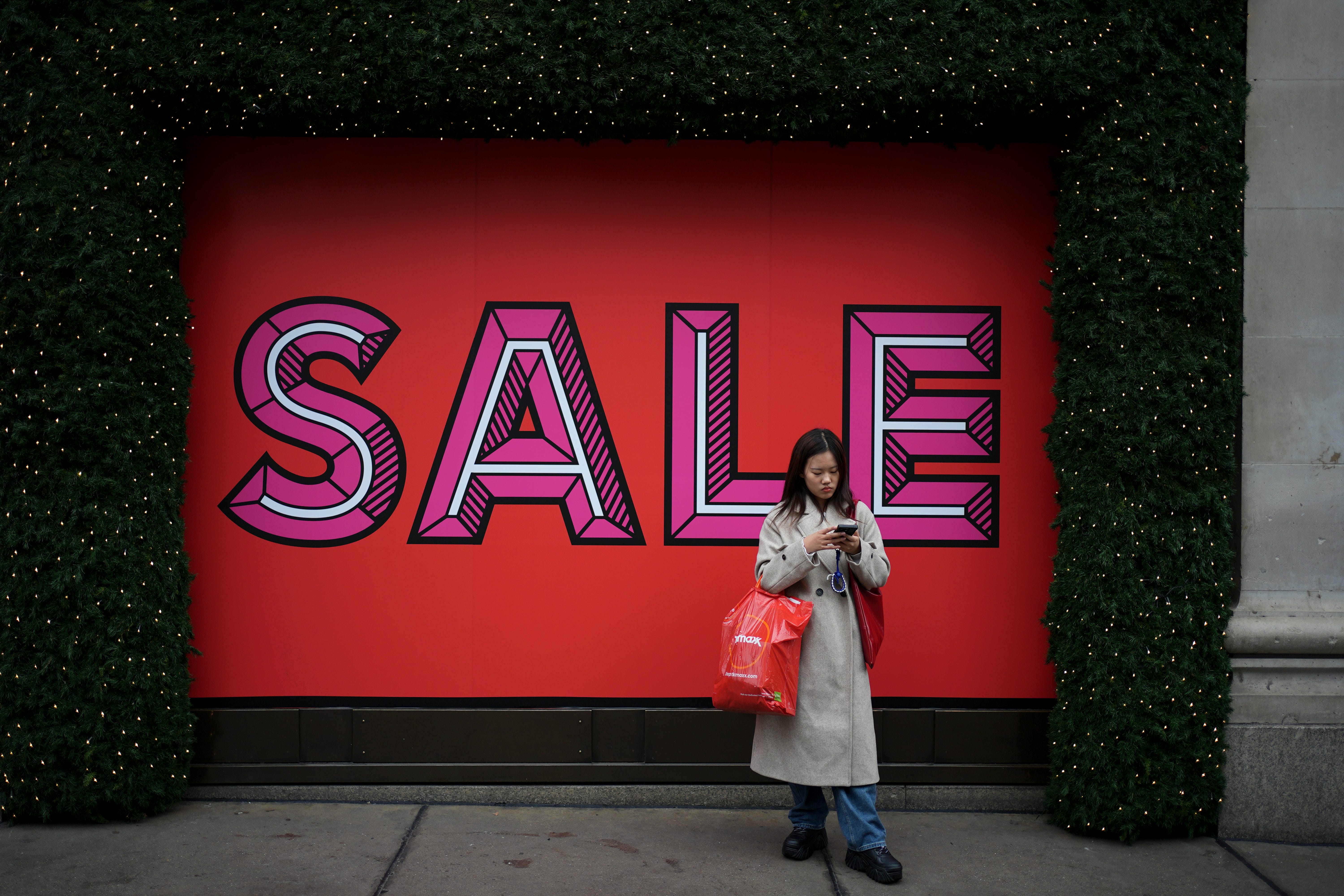 A shopper on Oxford Street, London (PA)