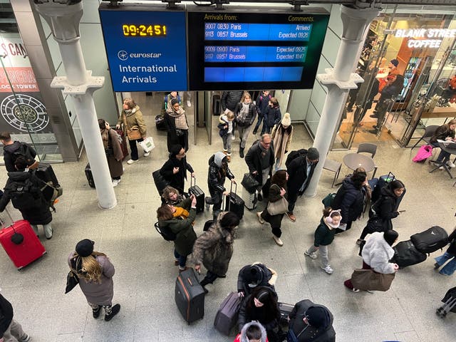 <p>Late arrivals: Passengers from Paris arriving at London St Pancras International almost an hour late</p>