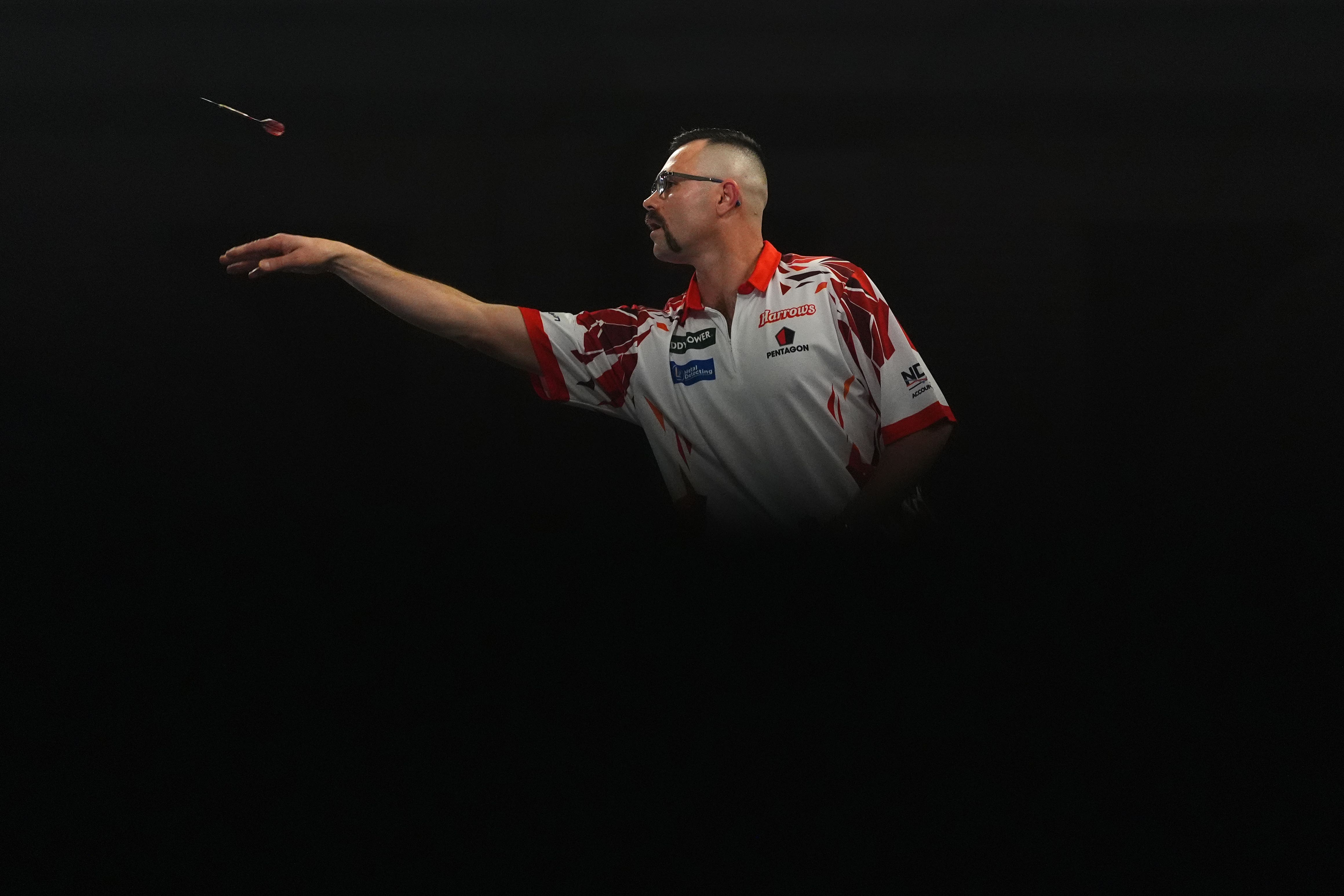 Damon Heta throwing his nine-darter (Zac Goodwin/PA)